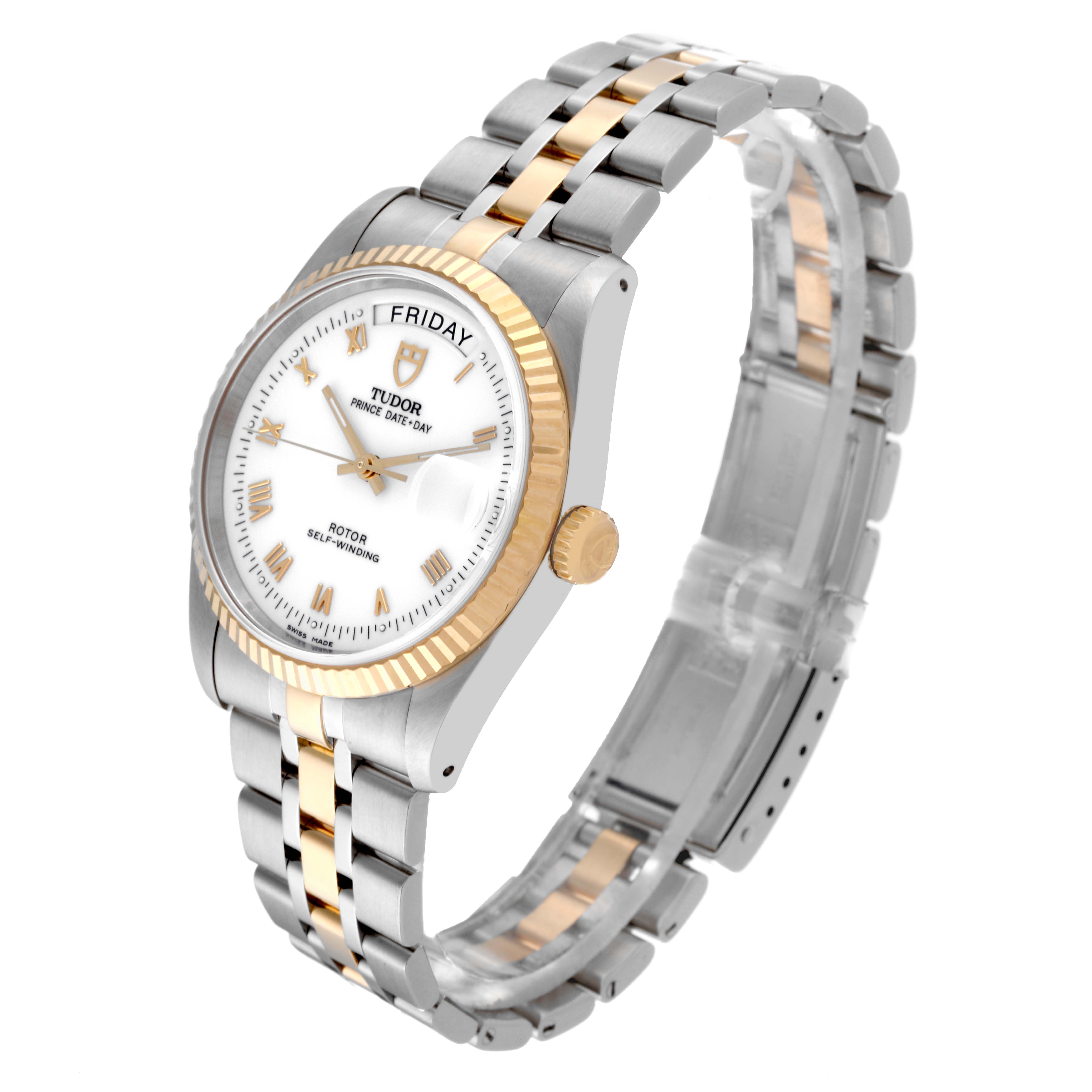 The Tudor Classic 76213 Men's Steel and Gold (two tone) White Dial 76213 Men's Steel and Gold (two tone) White Dial model is shown at a three-quarter angle, highlighting the bracelet, casing, and face with day and date display.