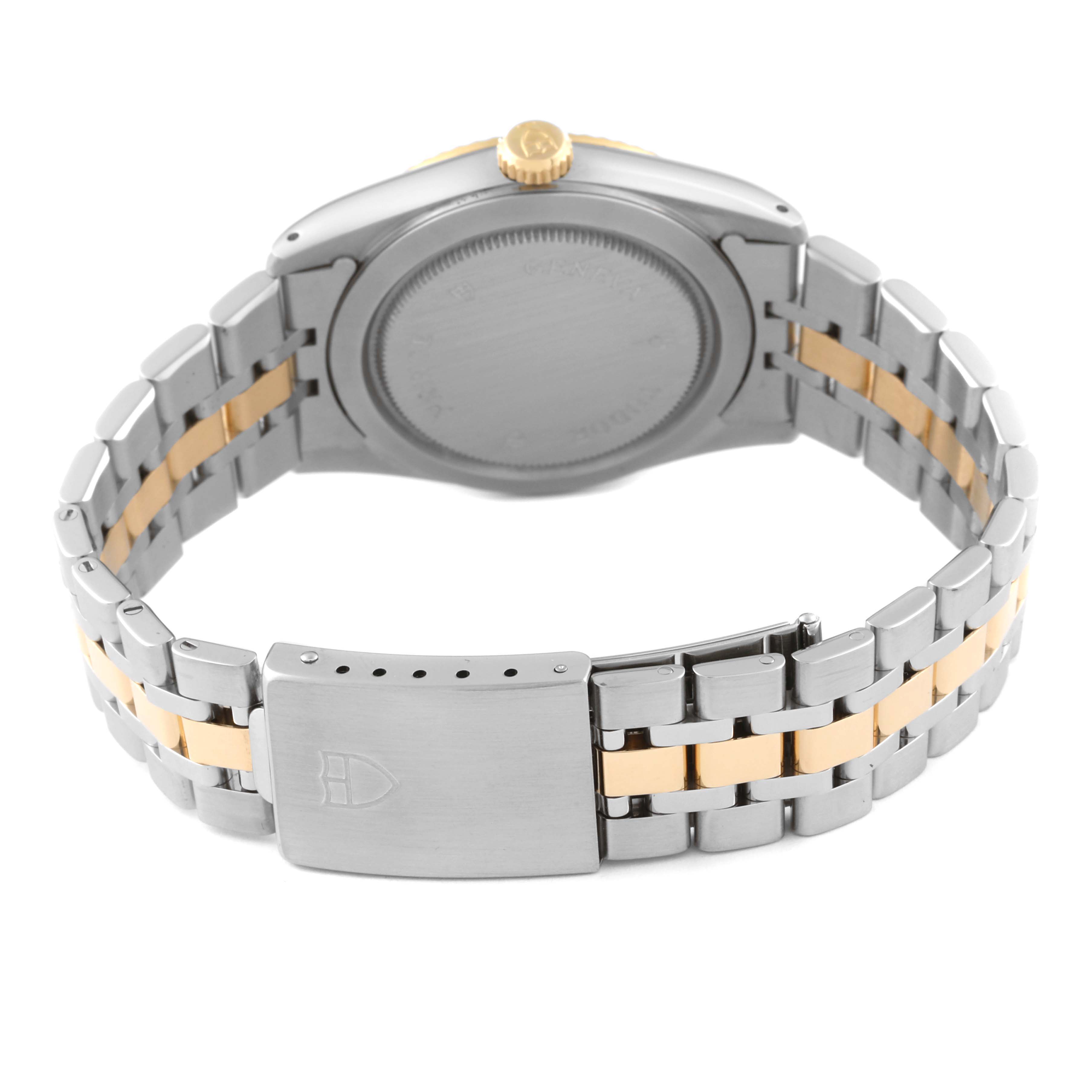 The Tudor Classic 76213 Men's Steel and Gold (two tone) White Dial 76213 Men's Steel and Gold (two tone) White Dial watch is shown from the back, featuring the case back, crown, and two-tone metal bracelet with a clasp.