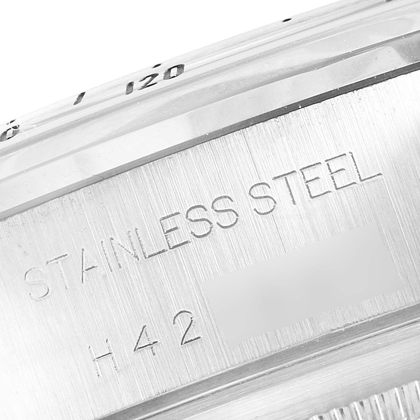 The image shows a close-up of the stainless steel case back of a Tudor Prince 79280 Men
s Stainless Steel Black Dial 79280 Men
s Stainless Steel Black Dial watch, displaying "STAINLESS STEEL" and part of the model number.