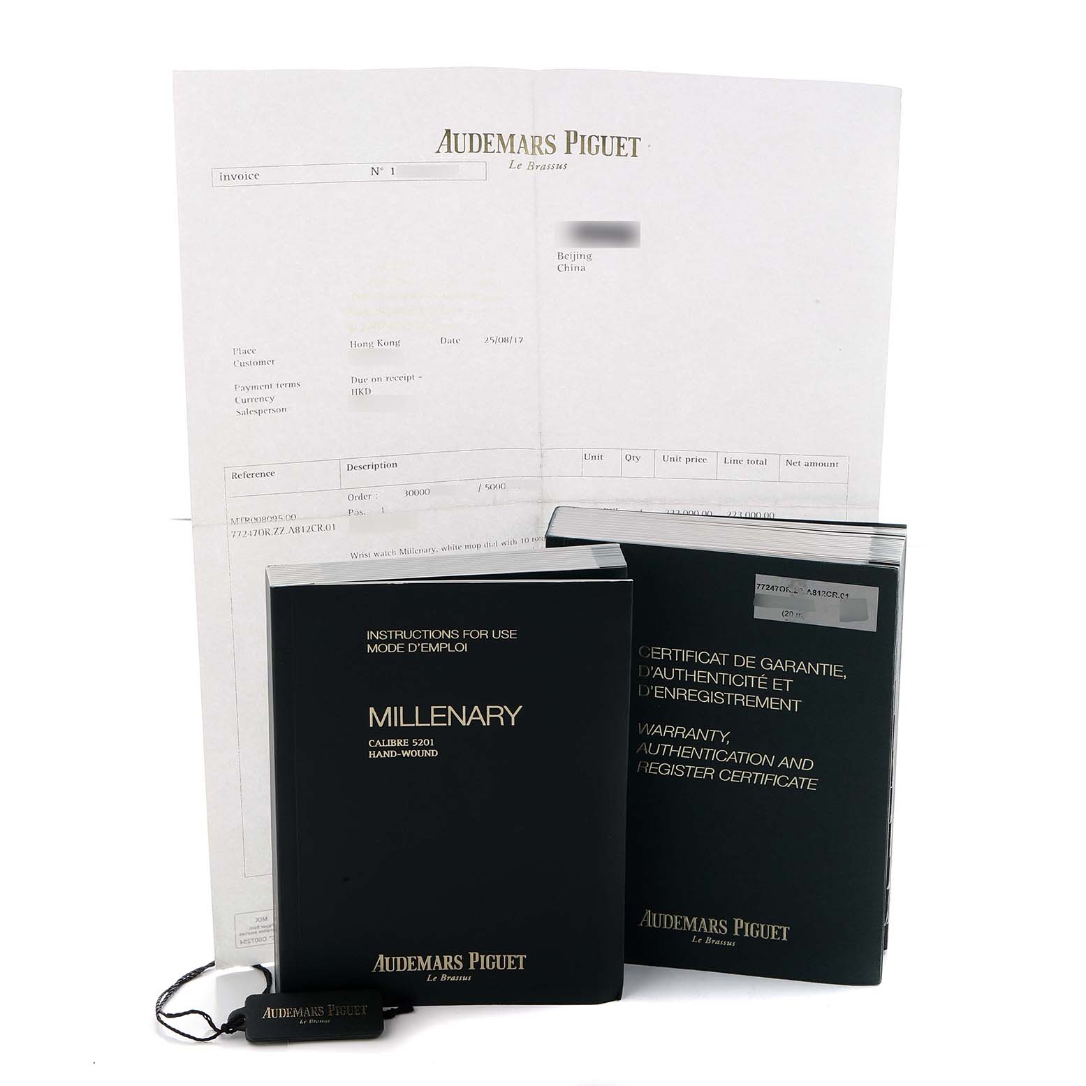 The image shows the instruction manual, warranty certificate, and tag for the Audemars Piguet Millenary 77247OR Women
s Rose Gold Mother of Pearl Dial model.