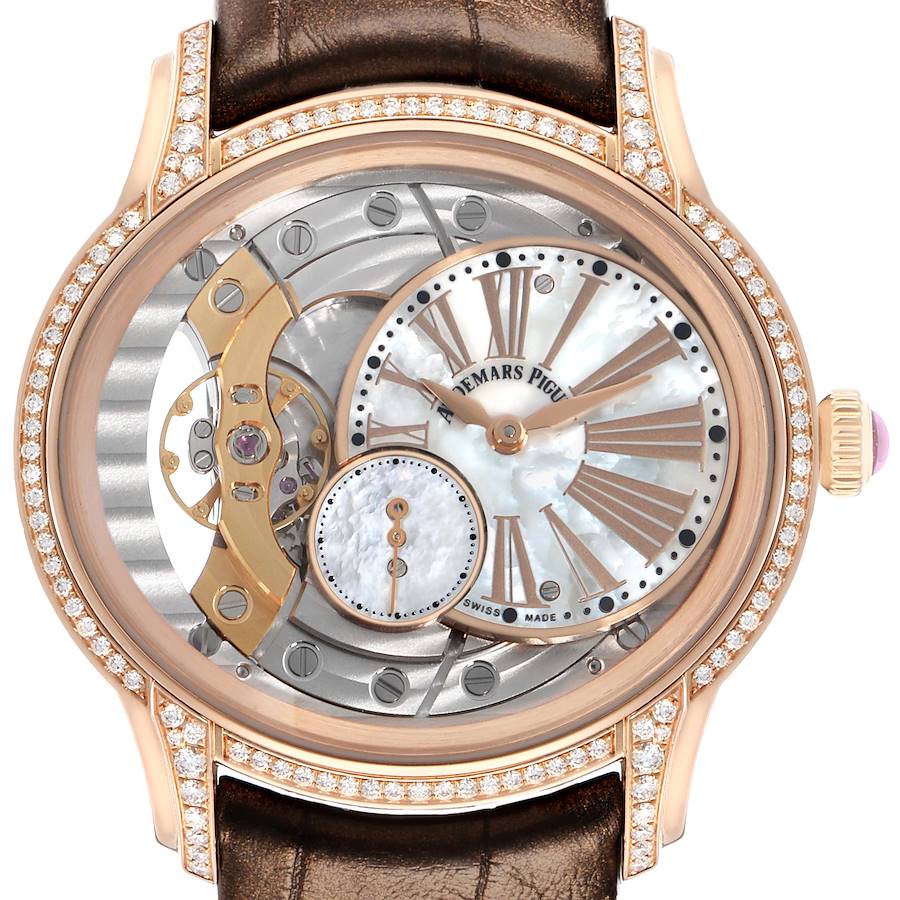 The Audemars Piguet Millenary 77247OR Women's Rose Gold Mother of Pearl Dial watch is shown from a front angle, displaying its dial, hour markers, and visible internal mechanics.