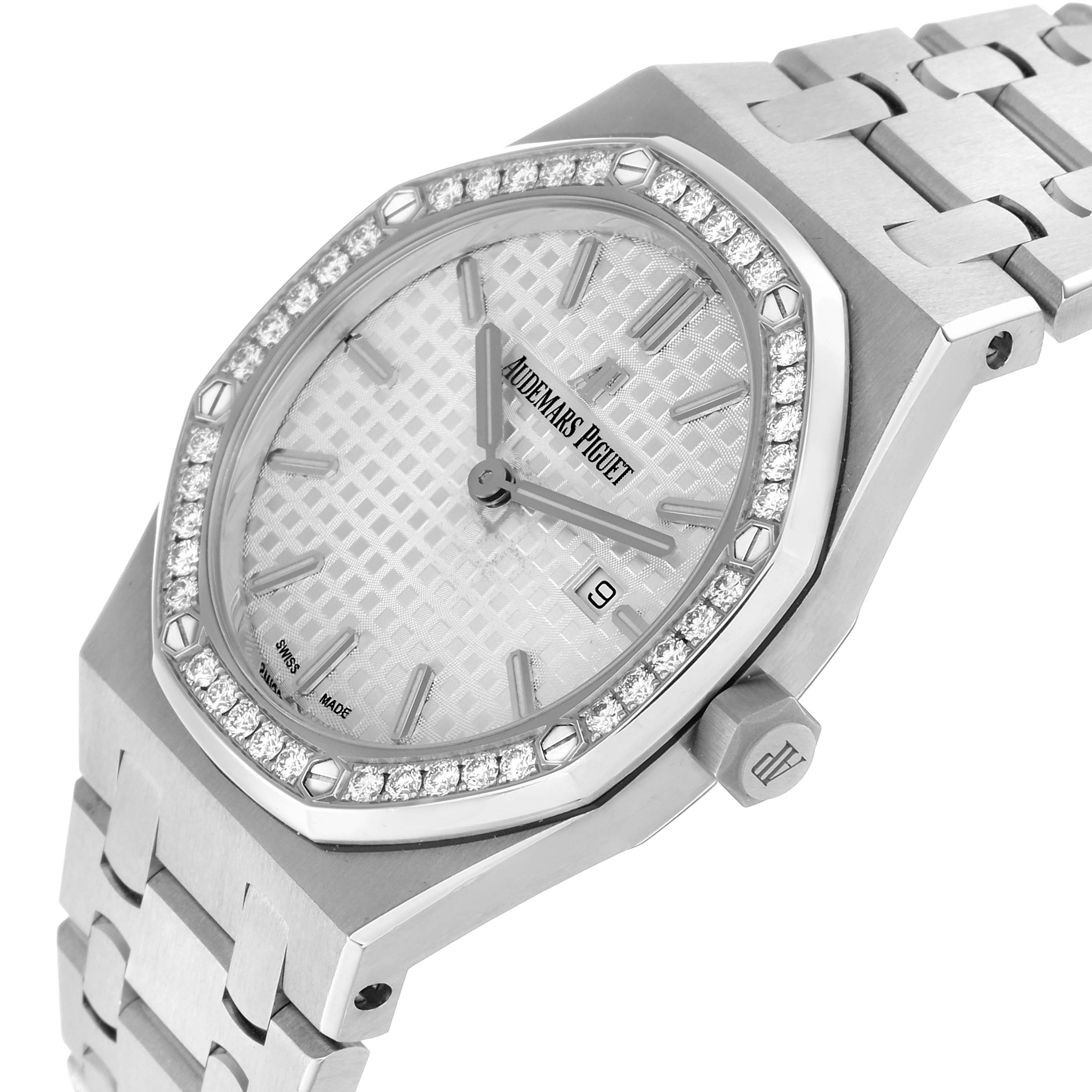 The Audemars Piguet Royal Oak 67651ST Women
s Stainless Steel Silver Dial watch is shown at a tilted angle, highlighting the diamond-set bezel, bracelet, and crown.