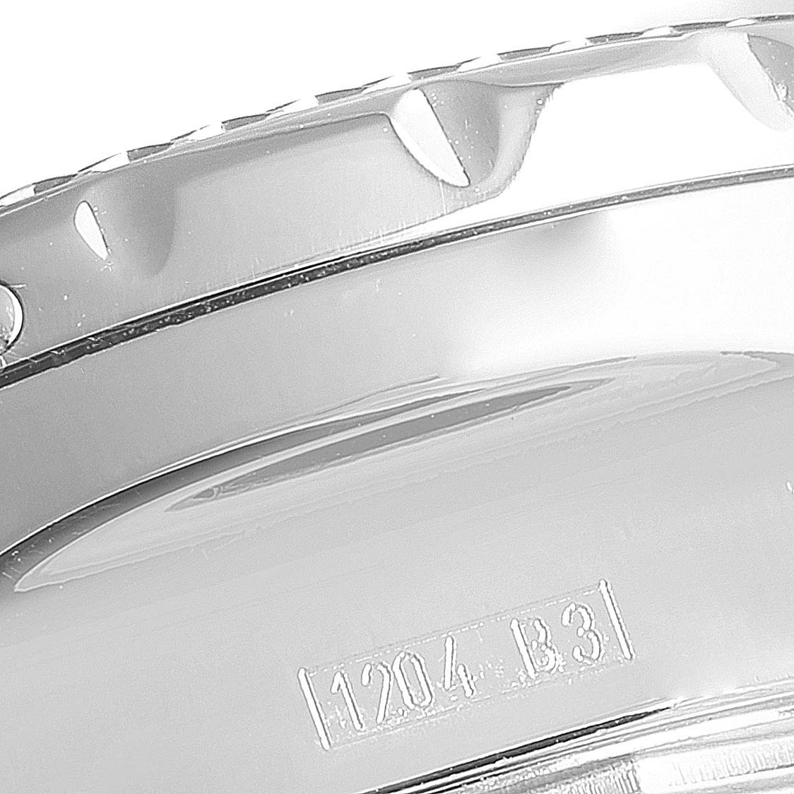 This close-up image of a Breitling Bentley A13362 Men's Stainless Steel Green Dial A13362 Men's Stainless Steel Green Dial watch shows a partial view of the bezel and case with engraved numbers.