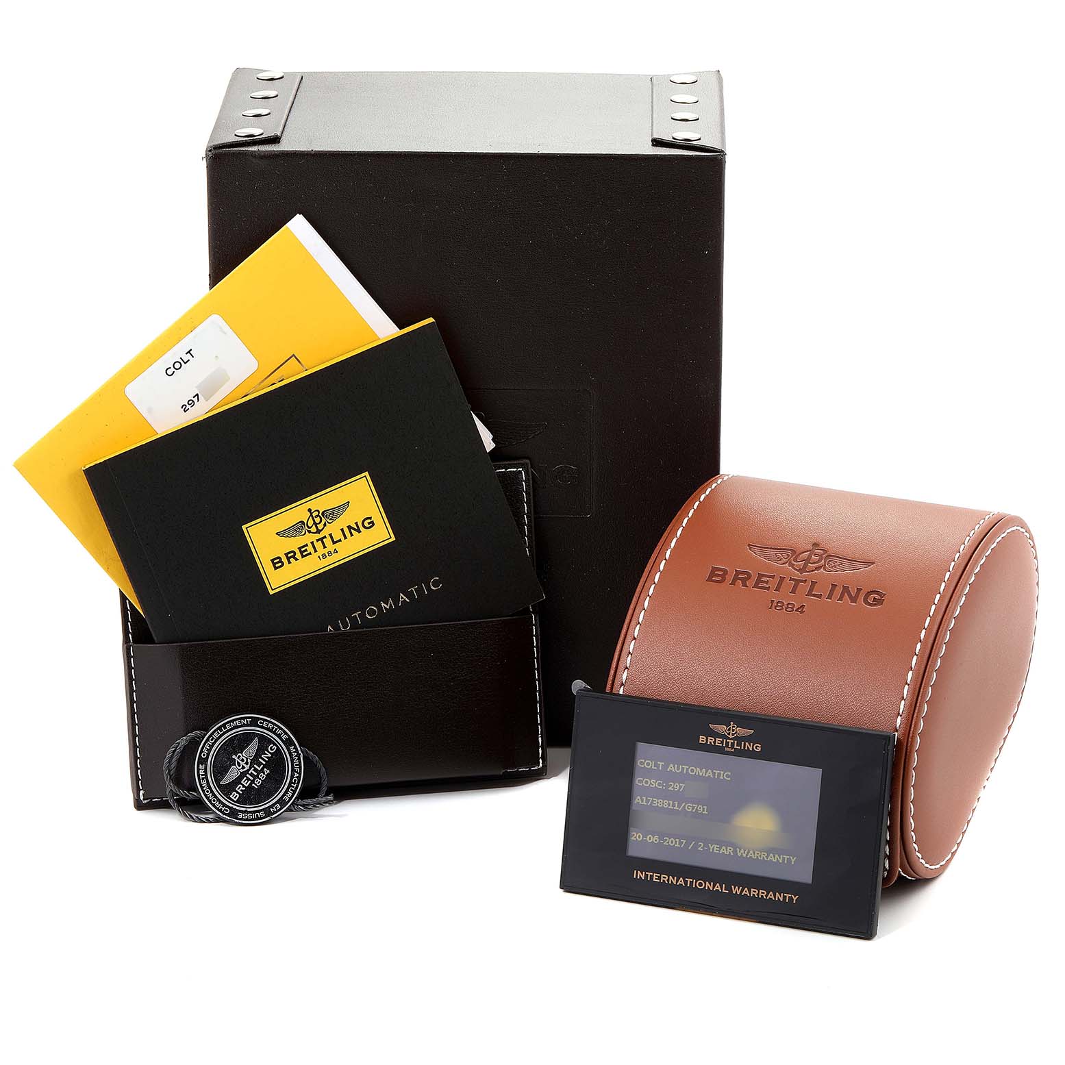 The image displays the packaging, warranty card, and manuals for a Breitling Colt A17388 Men's Stainless Steel White Dial A17388 Men's Stainless Steel White Dial model watch, along with a leather watch case.