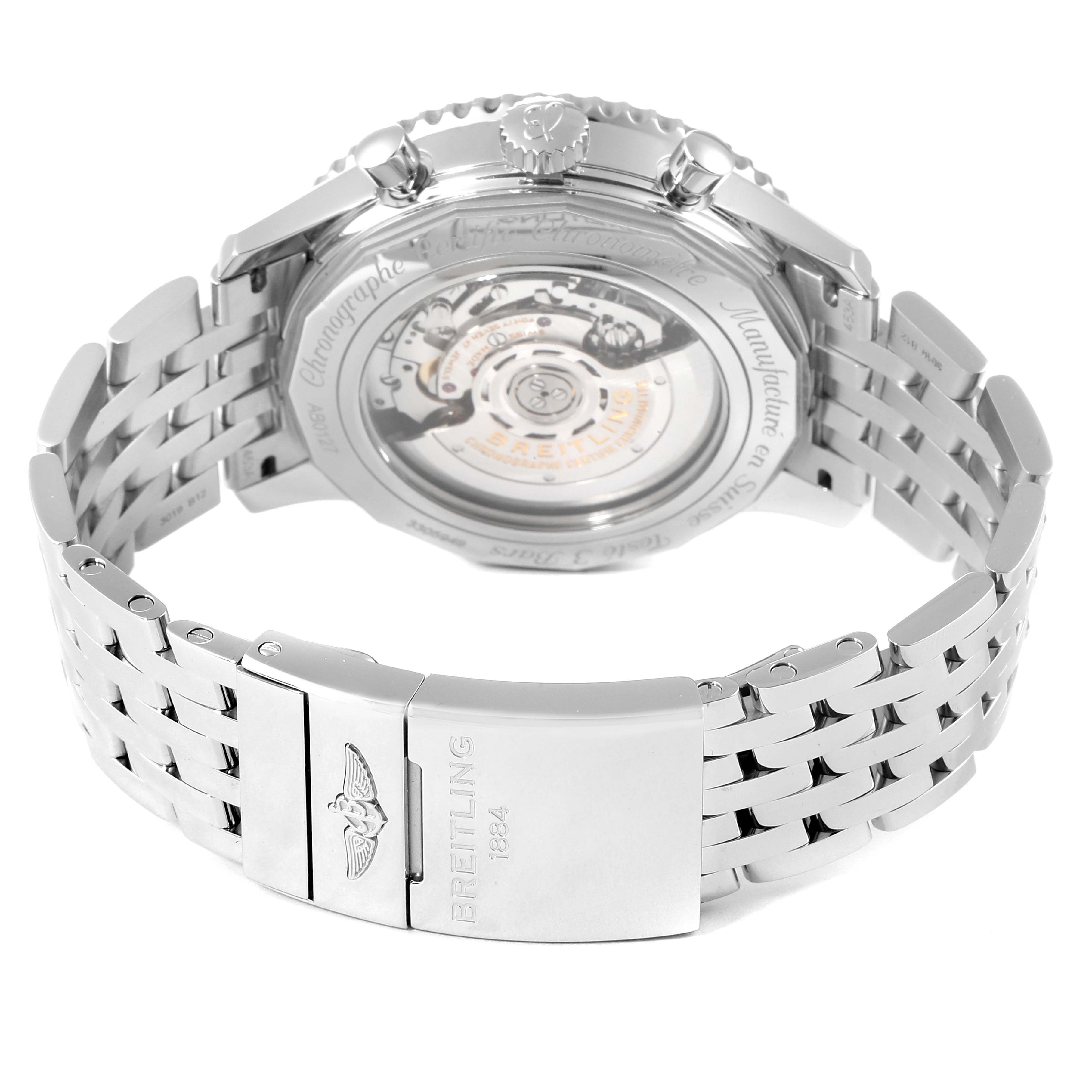 The image shows the back and clasp of a Breitling Navitimer AB0127-211-B1A1 Men
s Stainless Steel Black Dial AB0127-211-B1A1 Men
s Stainless Steel Black Dial watch, highlighting the transparent case back and metal bracelet.