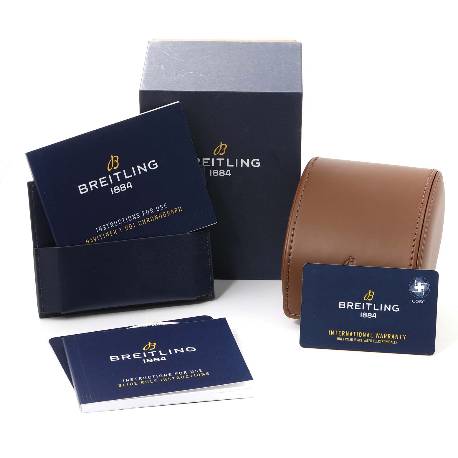 This image shows the packaging, instruction manuals, and warranty card for the Breitling Navitimer AB0127-211-B1A1 Men
s Stainless Steel Black Dial AB0127-211-B1A1 Men
s Stainless Steel Black Dial watch.