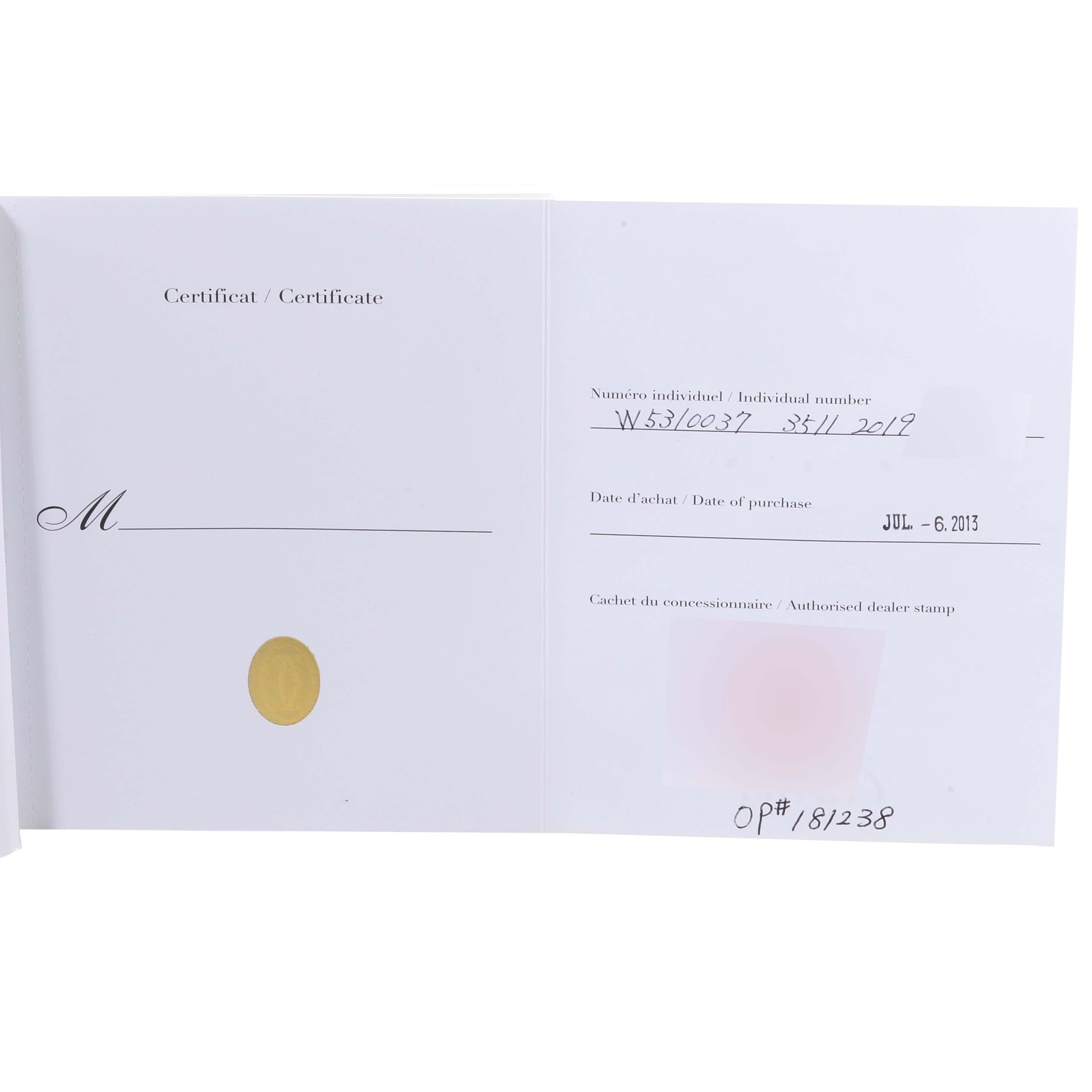 The image shows an open warranty certificate booklet for a Cartier Tank Anglaise W5310037 Men
s Steel and Gold (two tone) Silver Dial W5310037 Men
s Steel and Gold (two tone) Silver Dial watch.