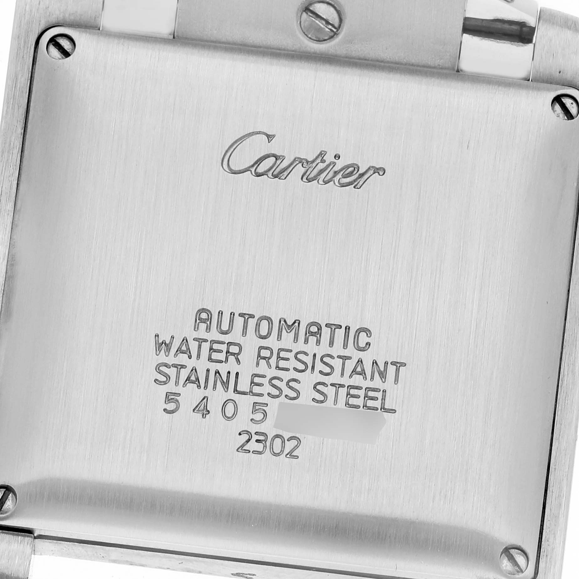 This image shows the back case of a Cartier Tank Française watch.