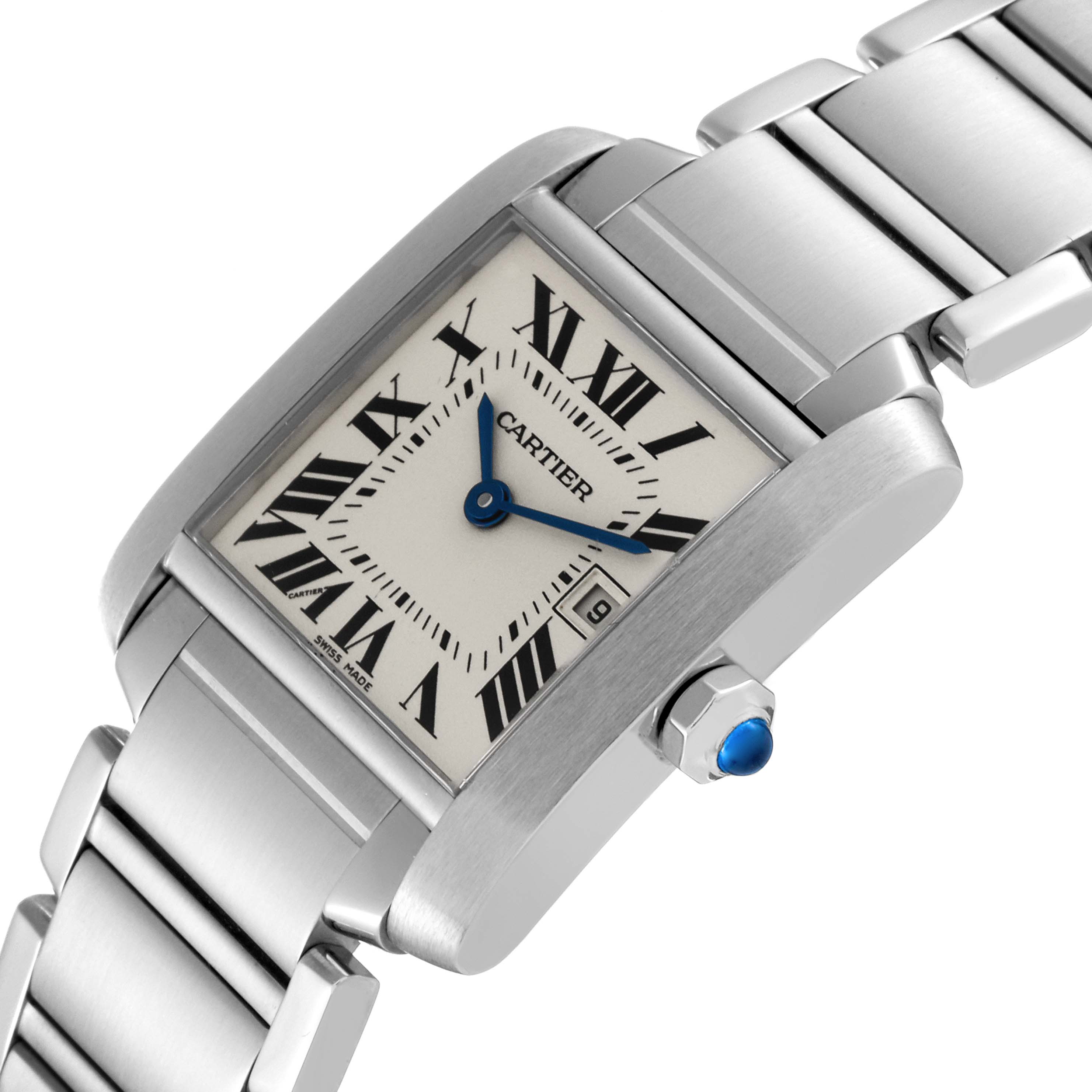 The image shows a close-up angle of the Cartier Tank Française watch, highlighting its face, Roman numerals, blue hands, and metal bracelet.