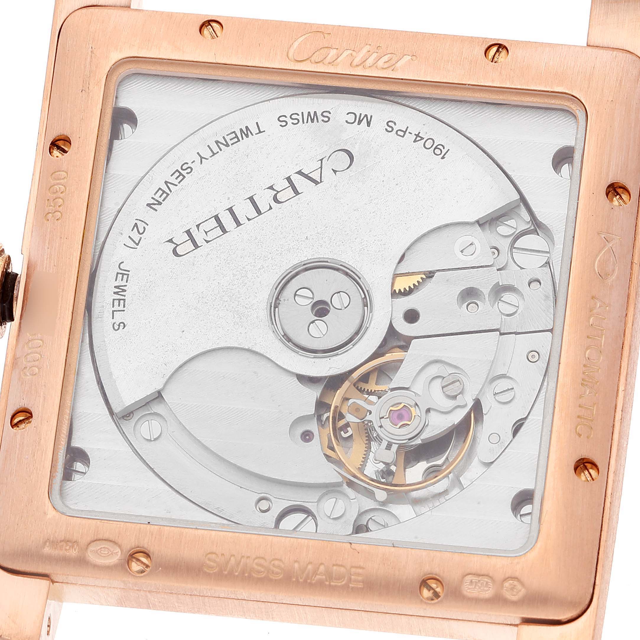 This image shows the caseback and movement of the Cartier Tank MC W5330002 Men's Rose Gold Brown Dial W5330002 Men's Rose Gold Brown Dial watch.