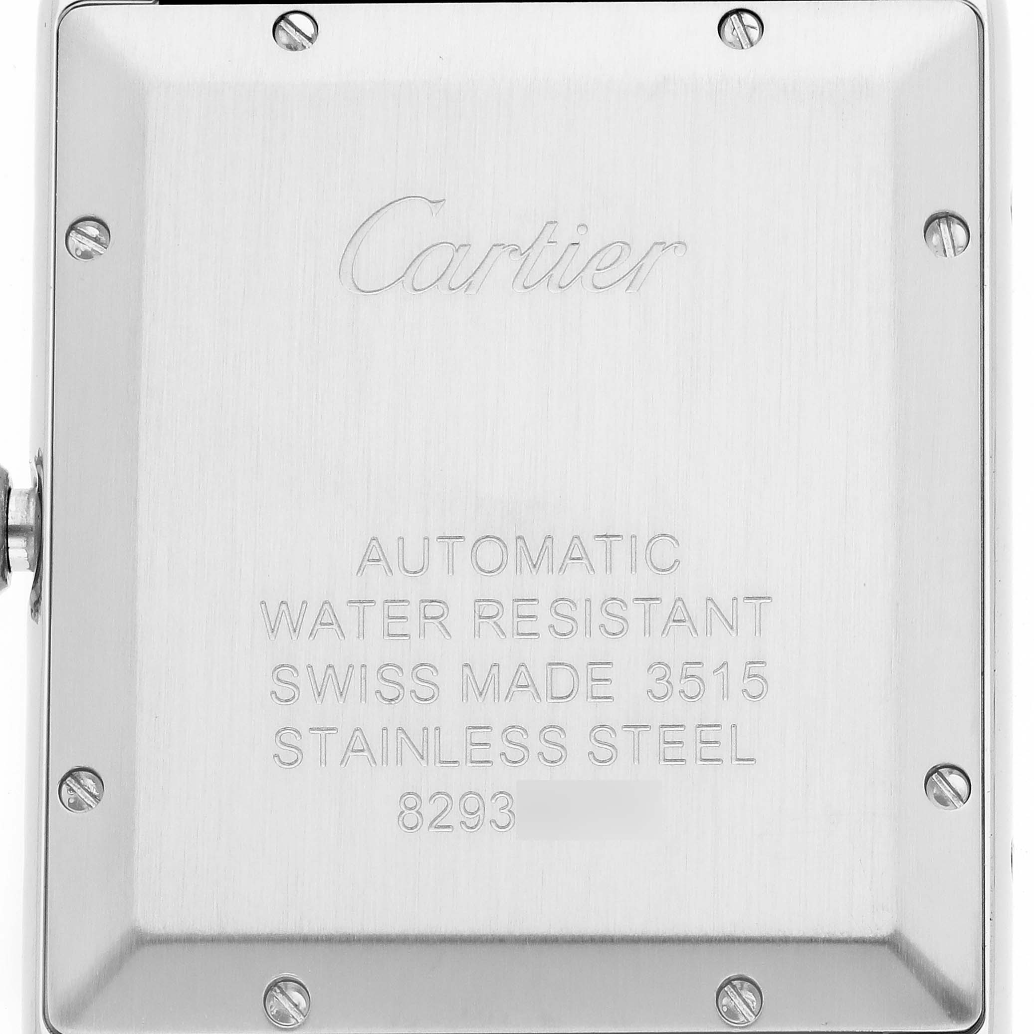 The image shows the back plate of a Cartier Tank Solo W5200027 Men
s Stainless Steel Silver Dial watch, displaying engravings and screws.