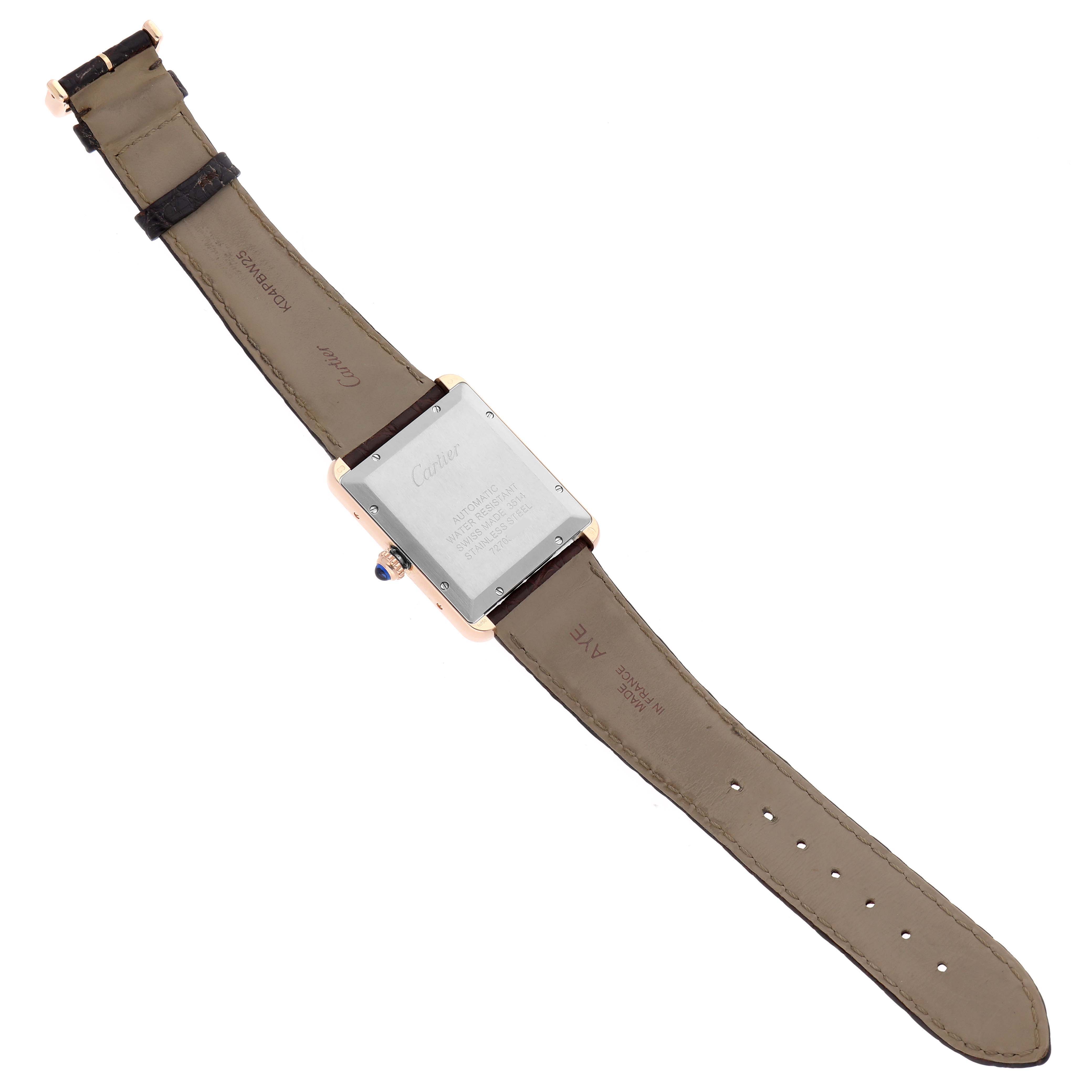 The image shows the back of a Cartier Tank Solo W5200026 Men
s Rose Gold Silver Dial watch, highlighting the case, strap, and clasp from an angled top-down view.