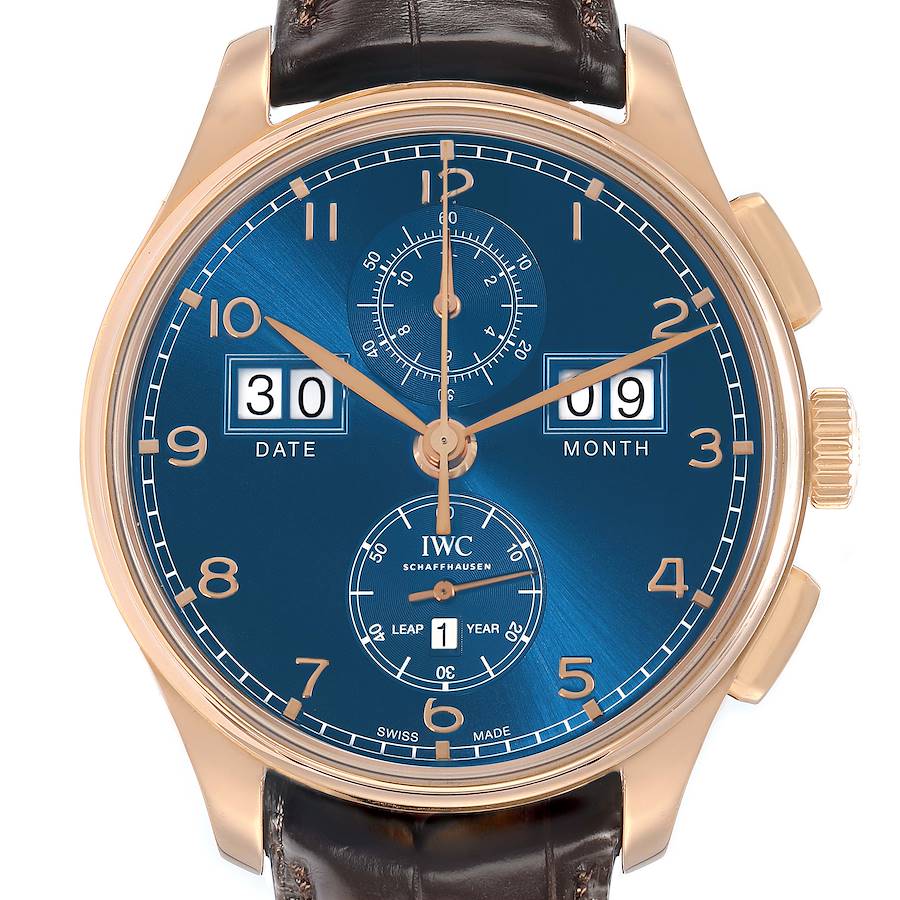 The IWC Portuguese IW397204 Men's Rose Gold Blue Dial watch is shown from the front, displaying the dial, hands, date, and month indicators.
