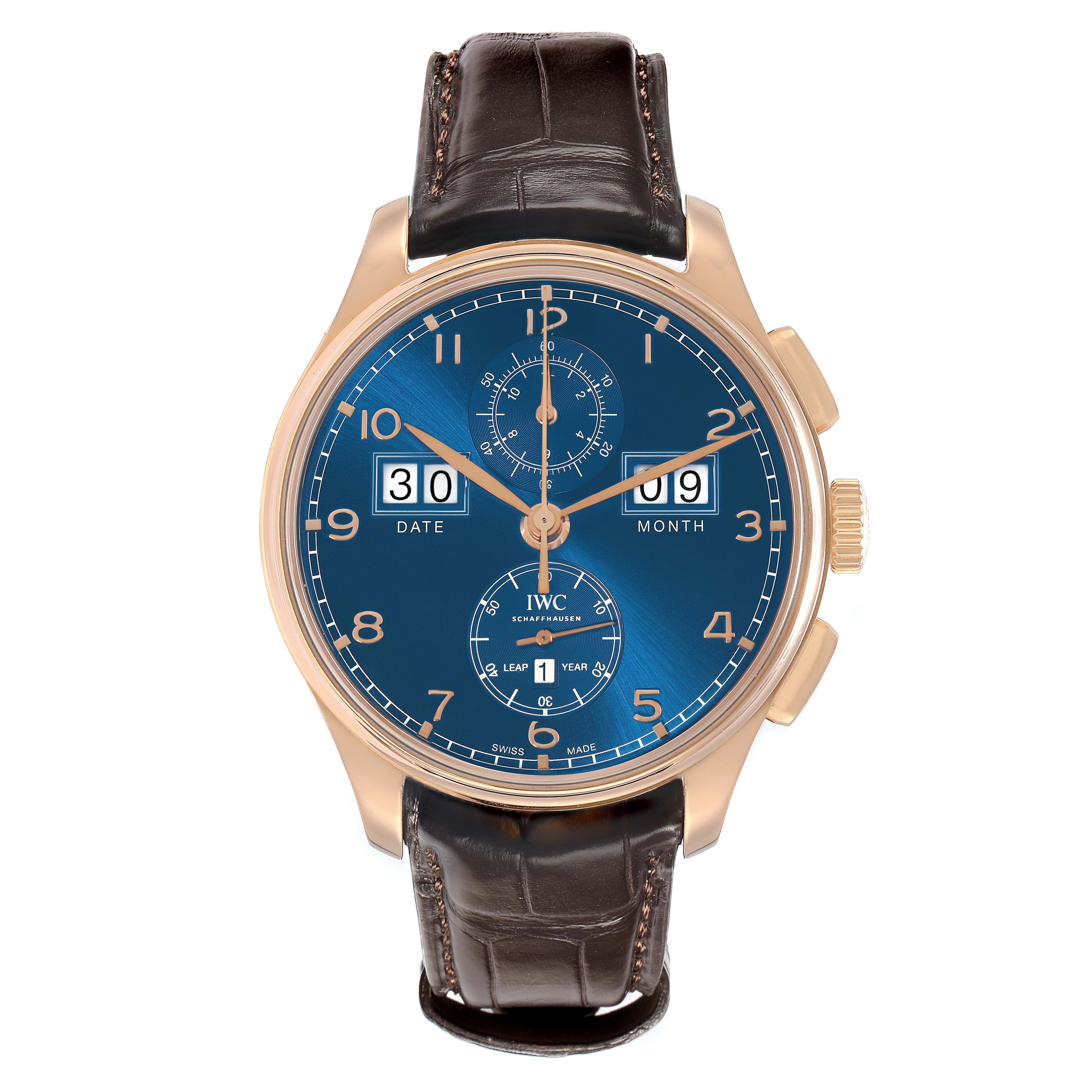 The IWC Portuguese IW397204 Men
s Rose Gold Blue Dial model watch is shown from a front angle, highlighting the blue dial, date, month, and leather strap.