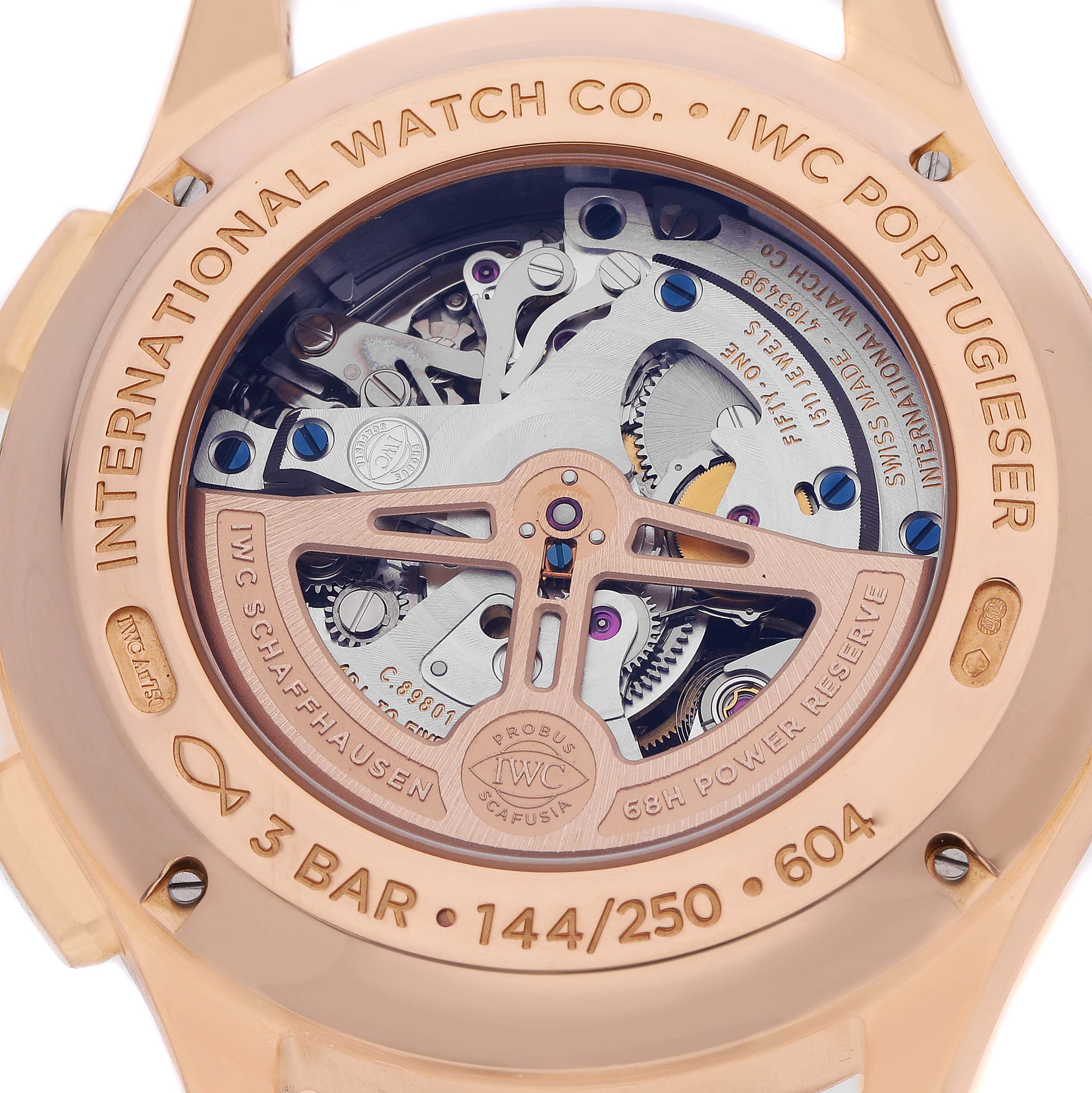 The image shows the back view of the IWC Portuguese IW397204 Men
s Rose Gold Blue Dial model, focusing on the movement and engraved details.