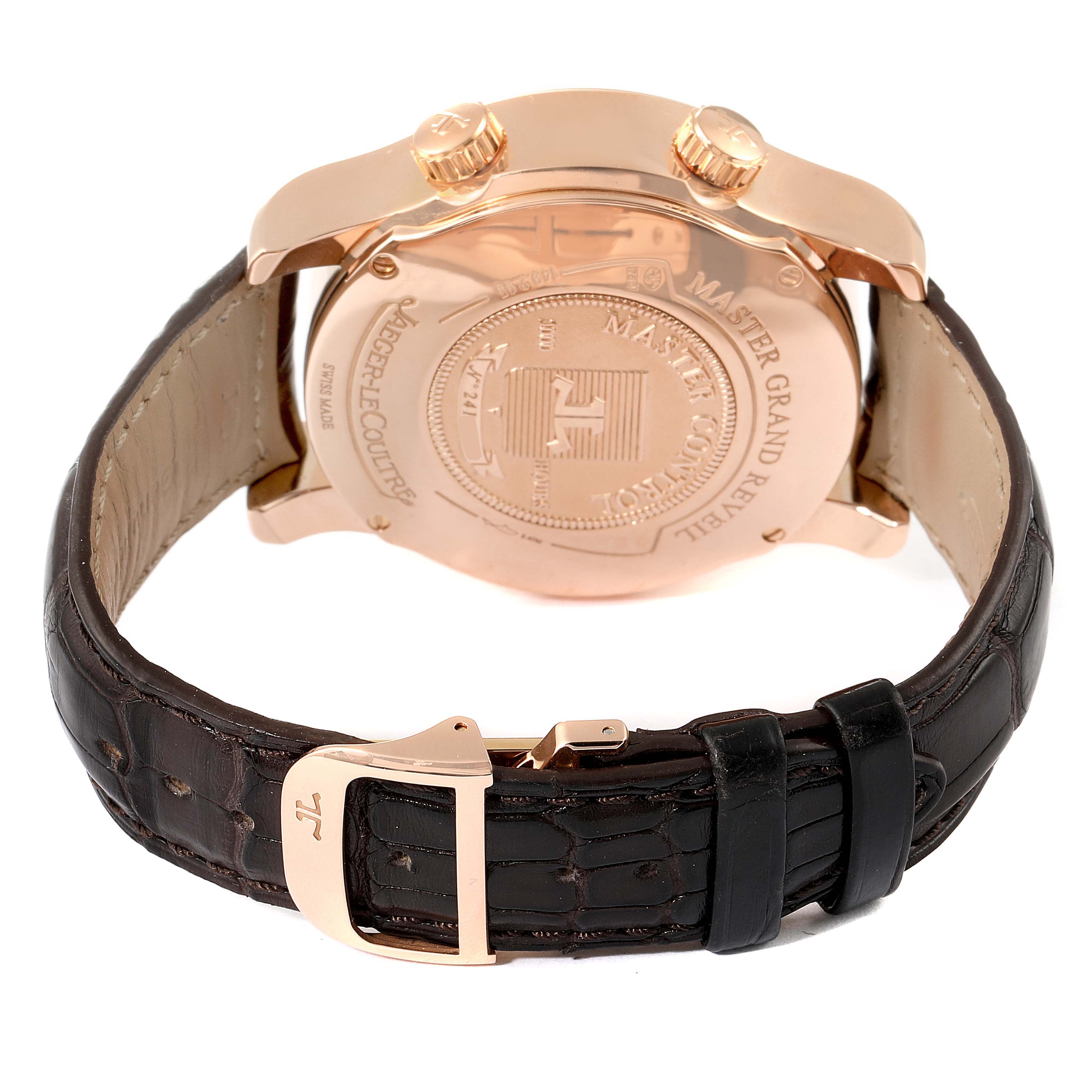 This image shows the back view of a Jaeger-LeCoultre Master watch, highlighting the case back, crown, and leather strap with a clasp.