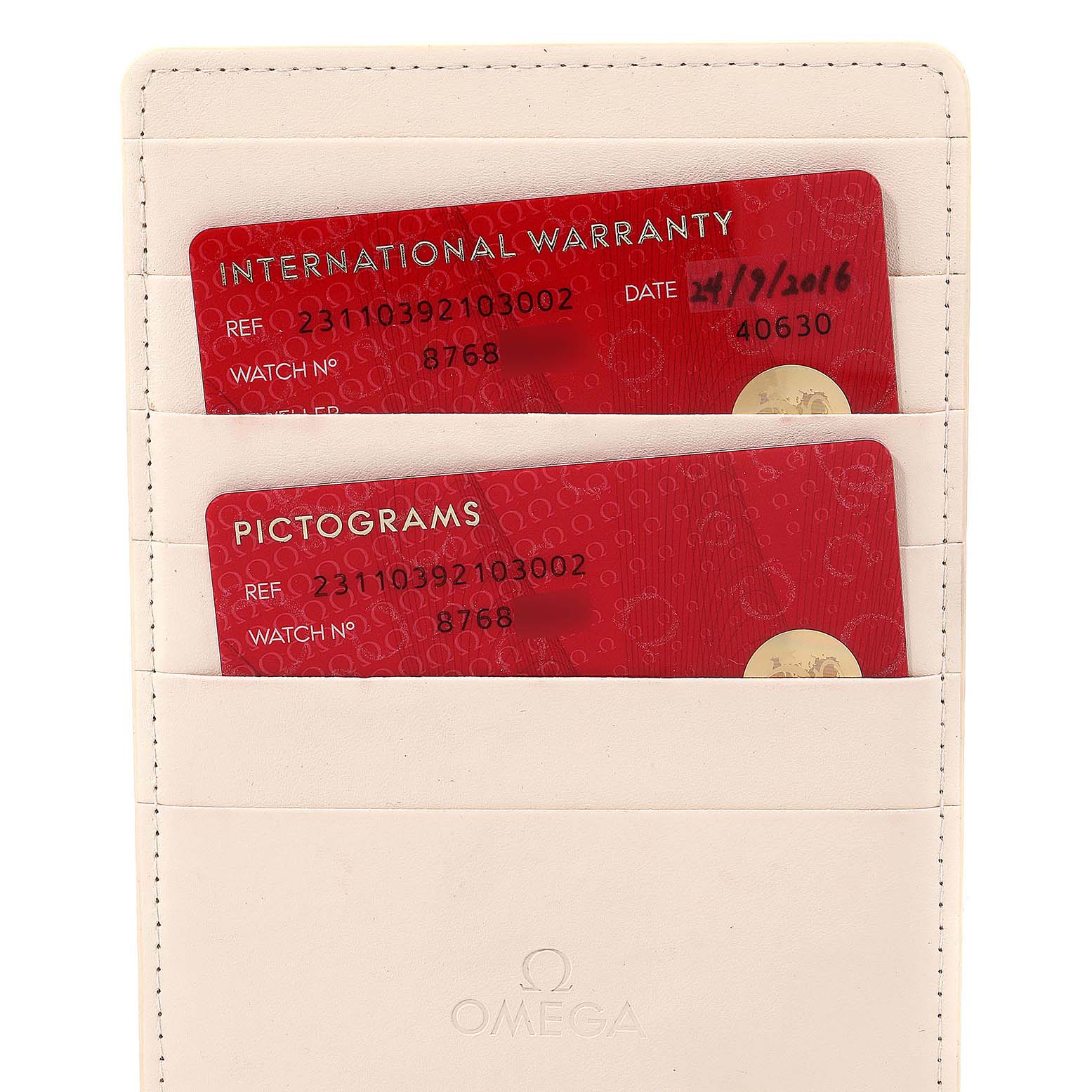 The image shows the international warranty and pictograms cards for the Omega Aqua Terra 231.10.39.21.03.002 Men
s Stainless Steel Blue Dial 231.10.39.21.03.002 Men
s Stainless Steel Blue Dial model, kept in a cardholder.