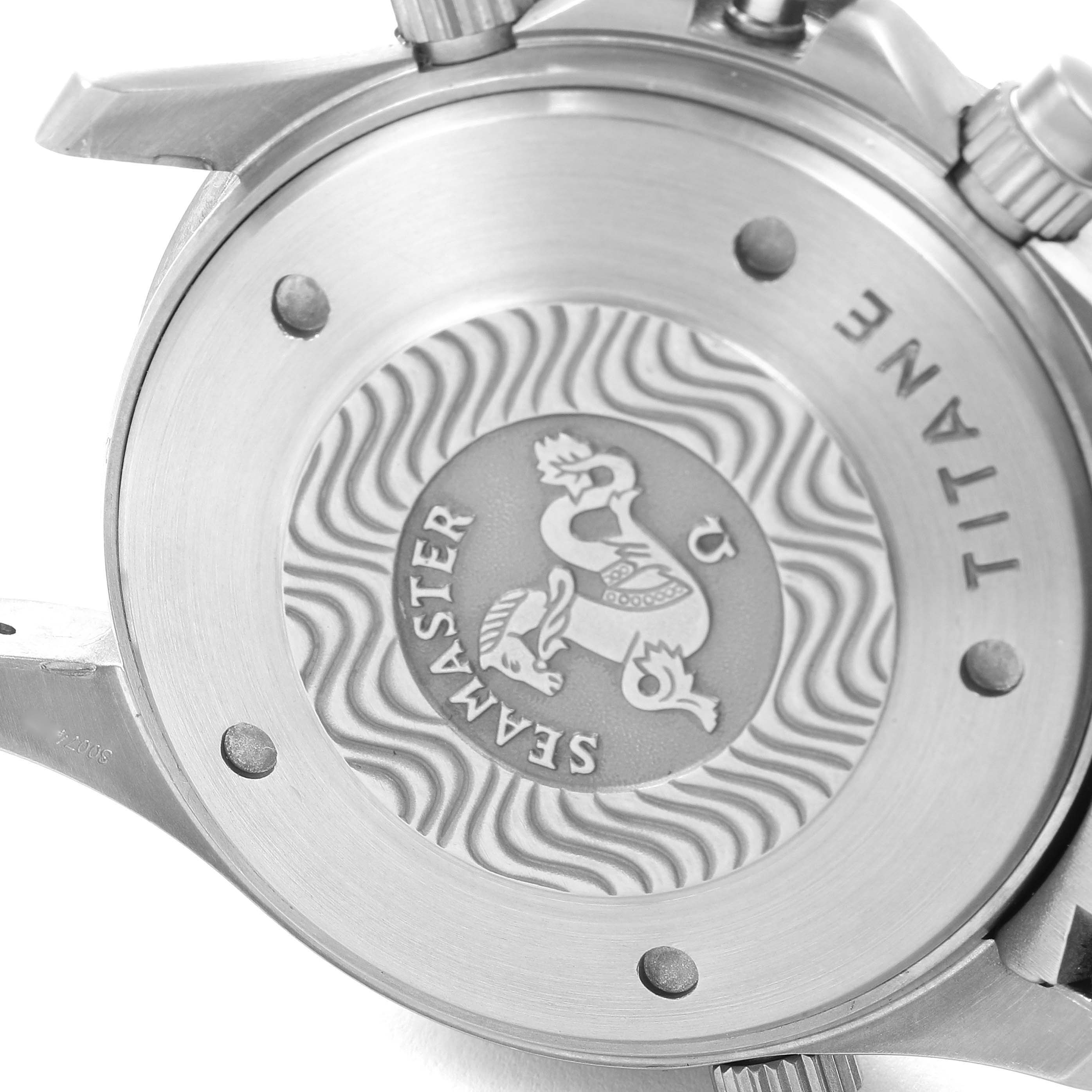 The image shows the case back of an Omega Seamaster 2298.80.00 Men's Titanium Blue Dial 2298.80.00 Men's Titanium Blue Dial watch, highlighting the iconic logo and "Titan" text.