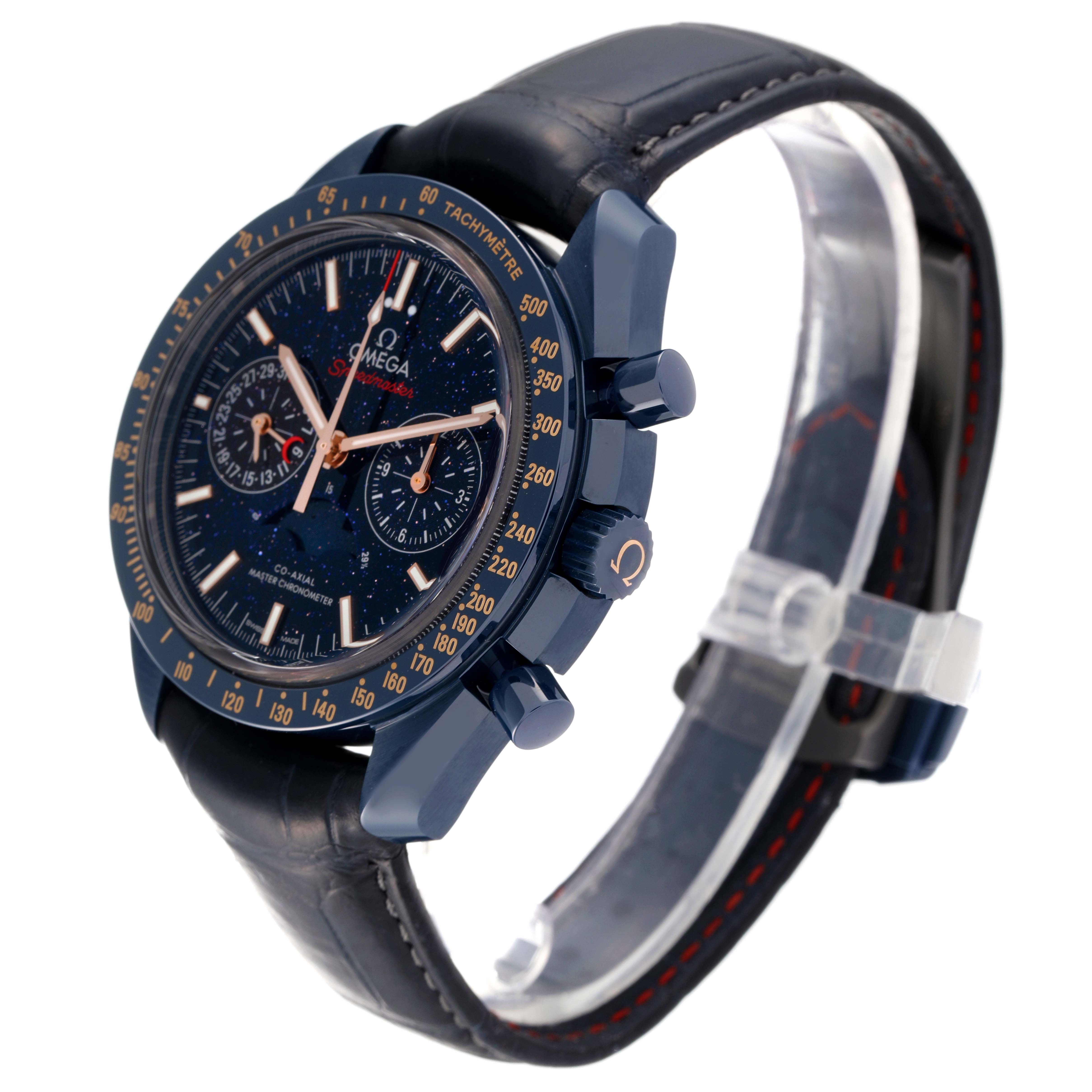 The image shows a side and front angle of the Omega Speedmaster 304.93.44.52.03.002 Men's Ceramic Blue Dial 304.93.44.52.03.002 Men's Ceramic Blue Dial, highlighting its dial, bezel, and leather strap.