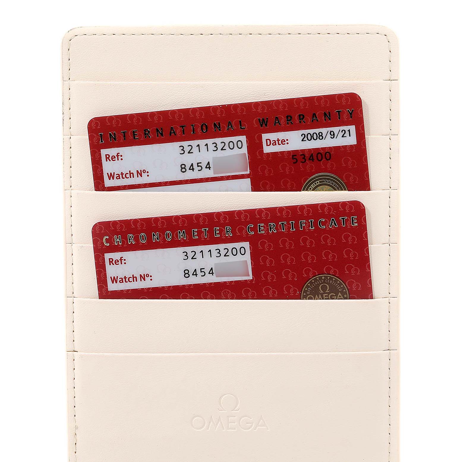 The image shows the warranty and chronometer certificate cards for an Omega Speedmaster 3211.32.00 Men
s Stainless Steel Silver Dial 3211.32.00 Men
s Stainless Steel Silver Dial watch, stored in a white cardholder.