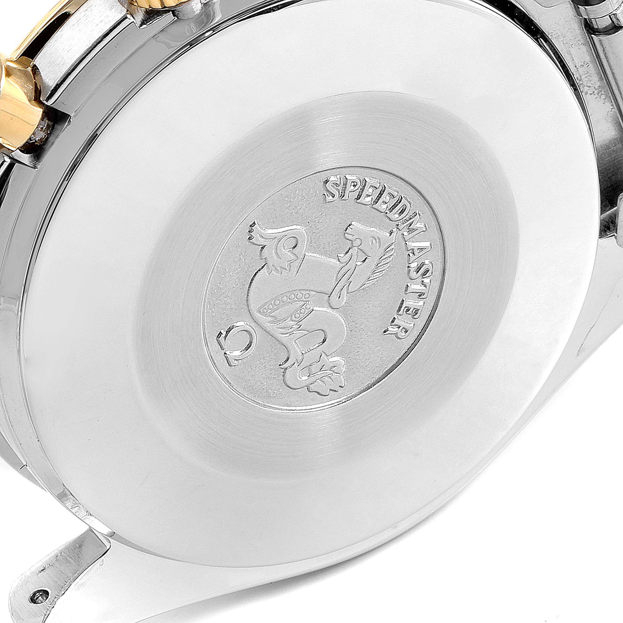 The image shows the case back and a portion of the metal bracelet of the Omega Speedmaster 3310.10.00 Men's Steel and Gold (two tone) Champagne Dial 3310.10.00 Men's Steel and Gold (two tone) Champagne Dial watch.