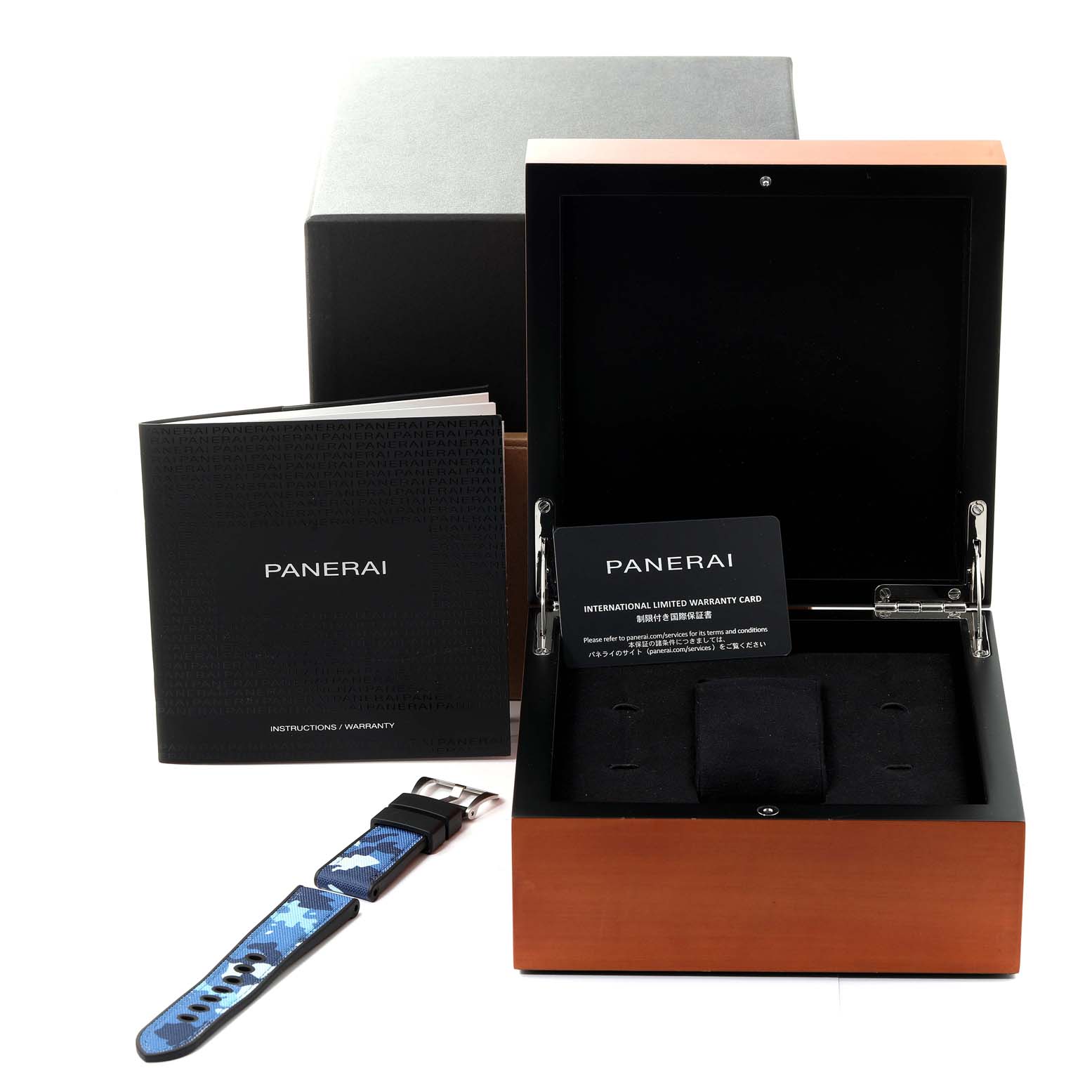 The image shows a Panerai Luminor PAM01316 Men's Stainless Steel Blue Dial PAM01316 Men's Stainless Steel Blue Dial watch box, an extra watch strap, warranty card, and instruction manual from a front angle.