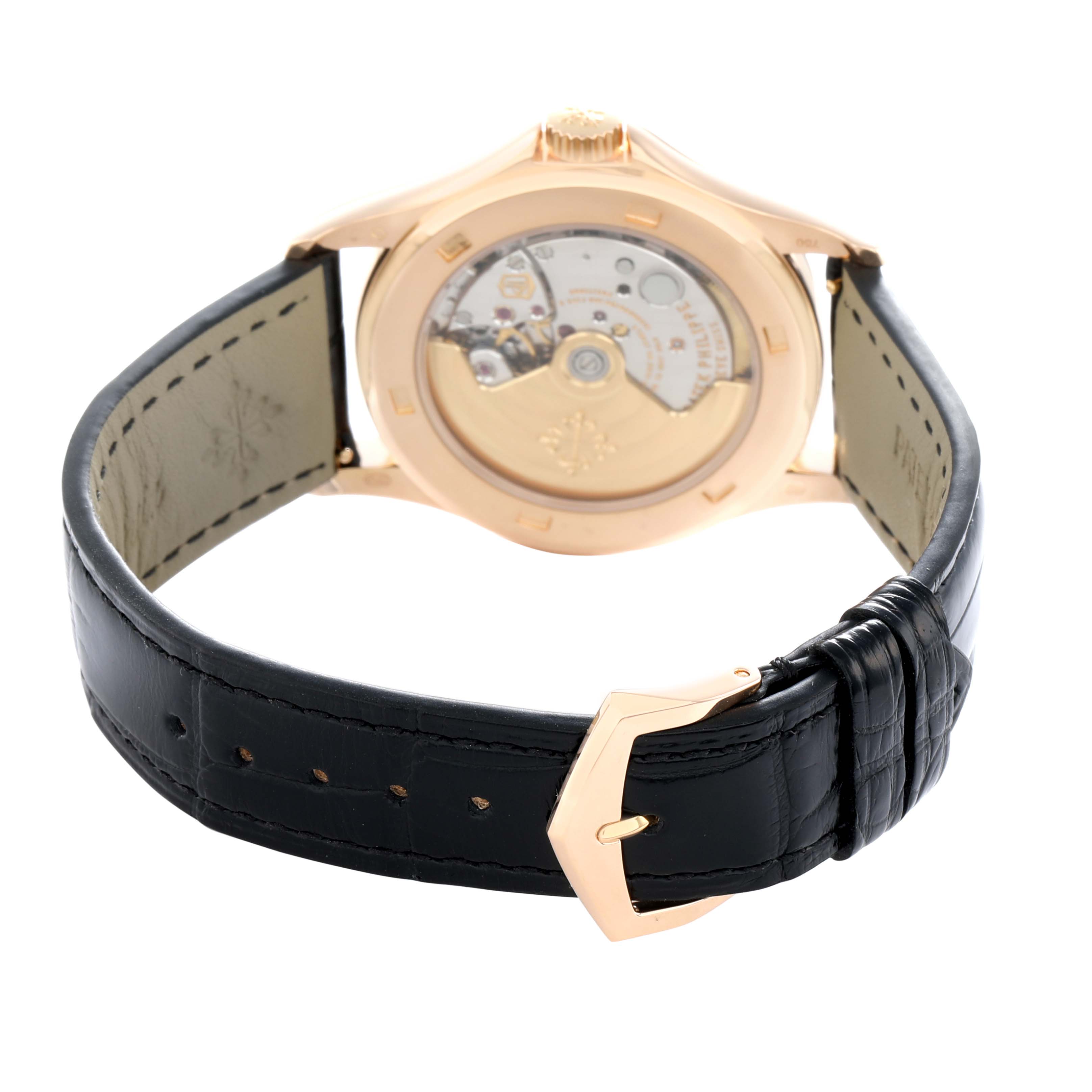 The image shows the back view of the Patek Philippe Calatrava 5127R Men
s Rose Gold Silver Dial, highlighting its mechanical movement and black leather strap.
