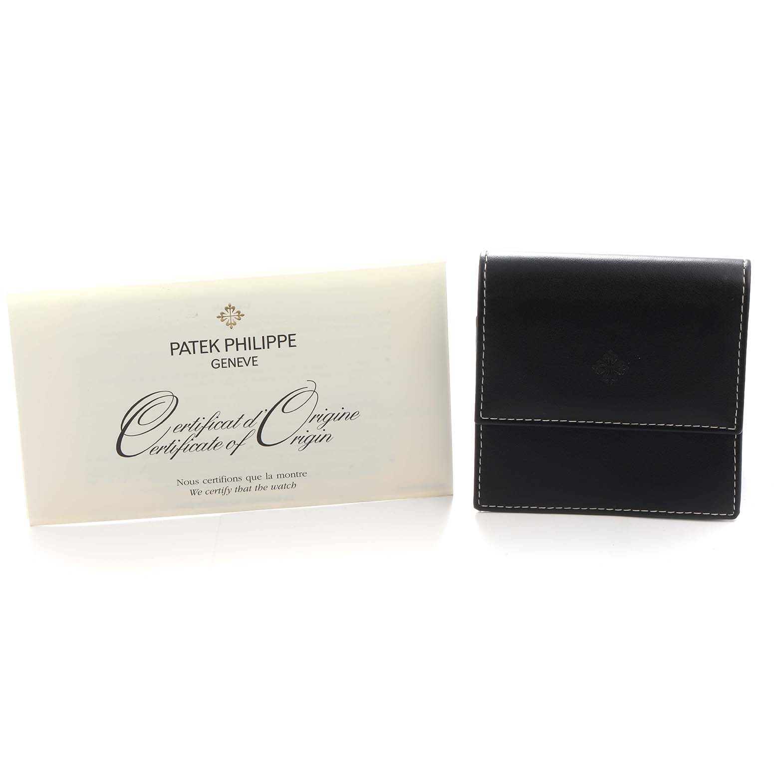 The image shows a certificate and a pouch for a Patek Philippe Calatrava 5127R Men
s Rose Gold Silver Dial watch.