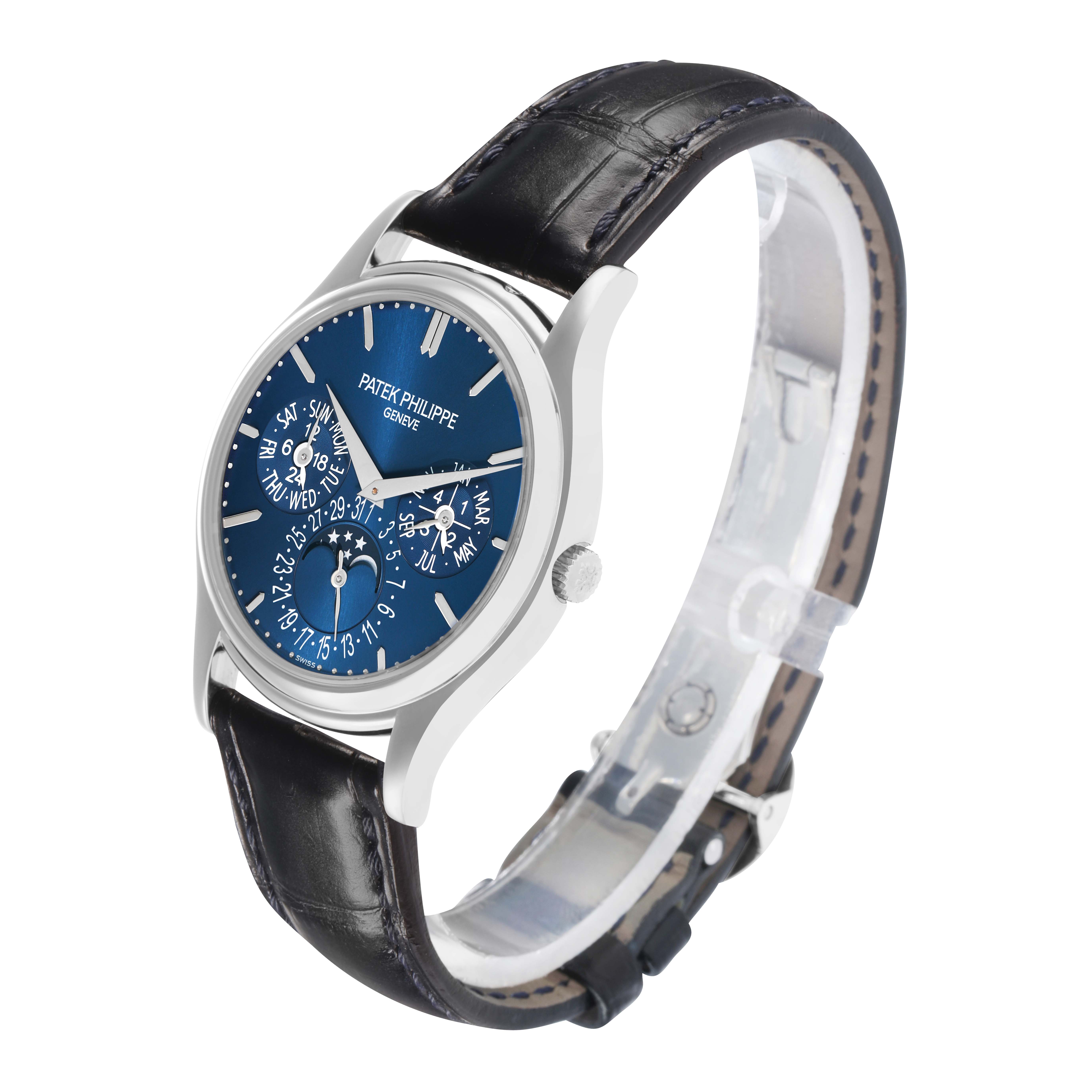 The Patek Philippe Complications 5140P Men
s Platinum Blue Dial watch is shown at a slight angle, highlighting the blue dial, silver case, and leather strap.