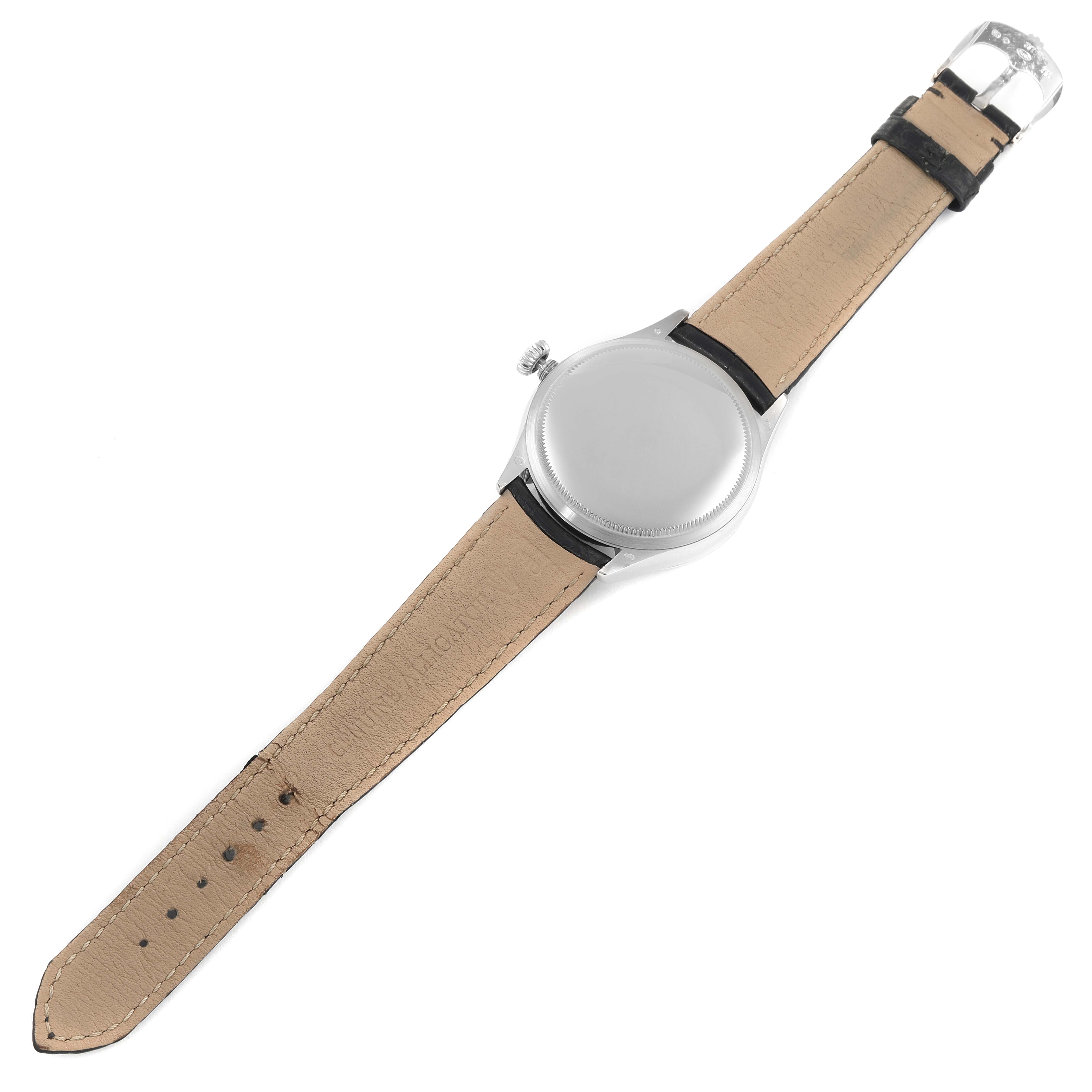 This is the back view of a Rolex Cellini 50529 Men's White Gold Black Dial 50529 Men's White Gold Black Dial watch, showing the caseback, crown, and leather strap.