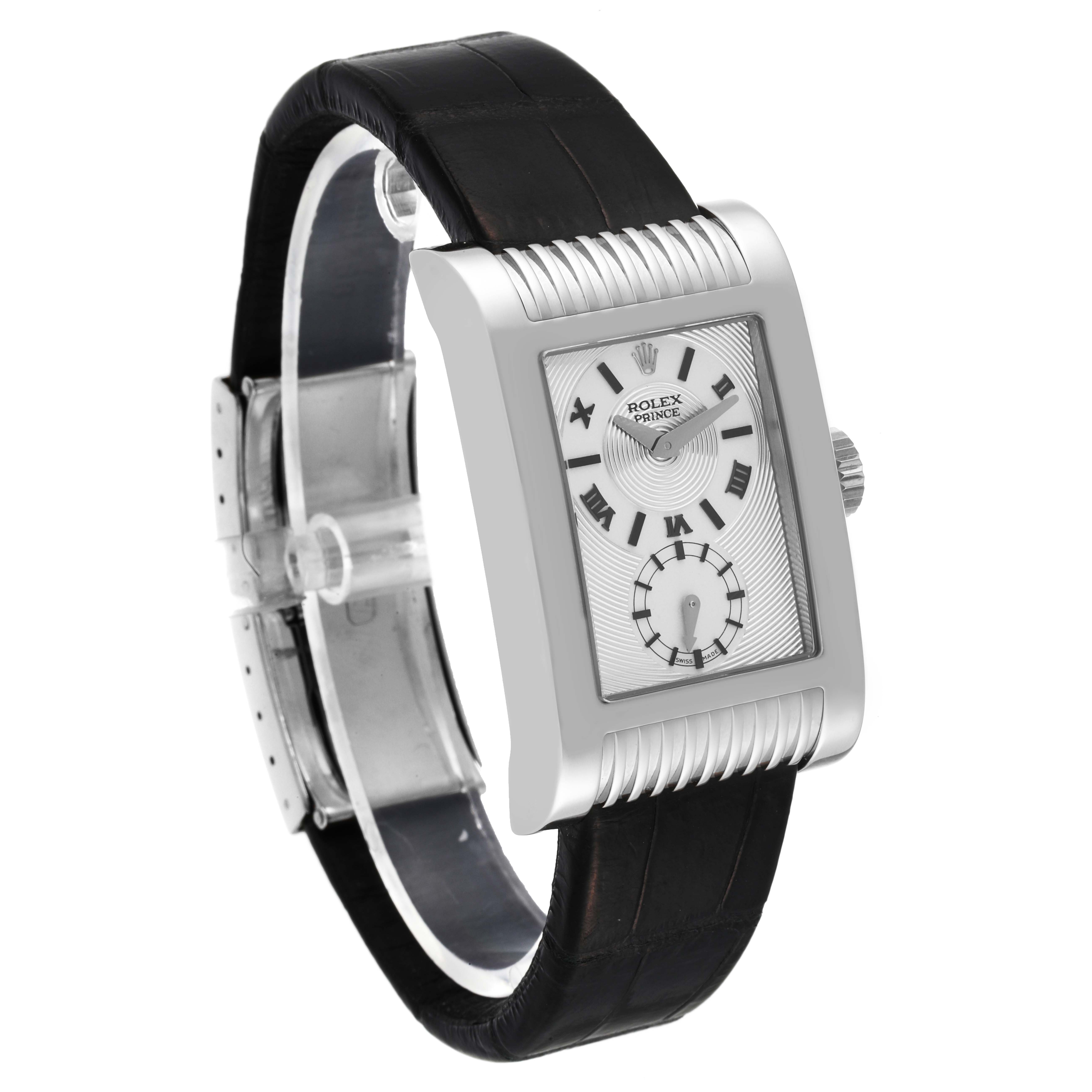 The image shows a Rolex Cellini 5441 Men
s White Gold Silver Dial 5441 Men
s White Gold Silver Dial Prince watch at a slight angle, featuring its rectangular dial and black leather strap.