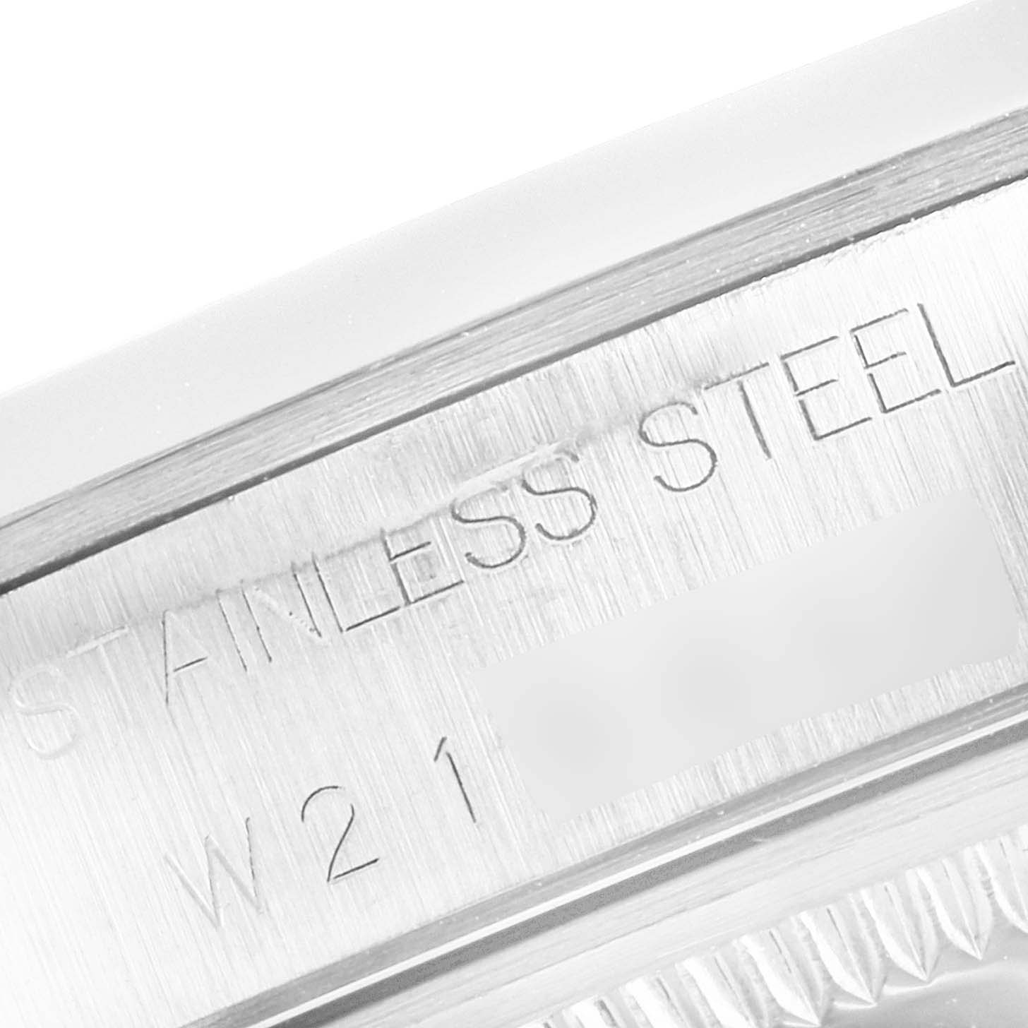 The image shows a close-up of the stainless steel marking on the side of a Rolex Datejust 15200 Men's Stainless Steel Blue Dial 15200 Men's Stainless Steel Blue Dial watch.