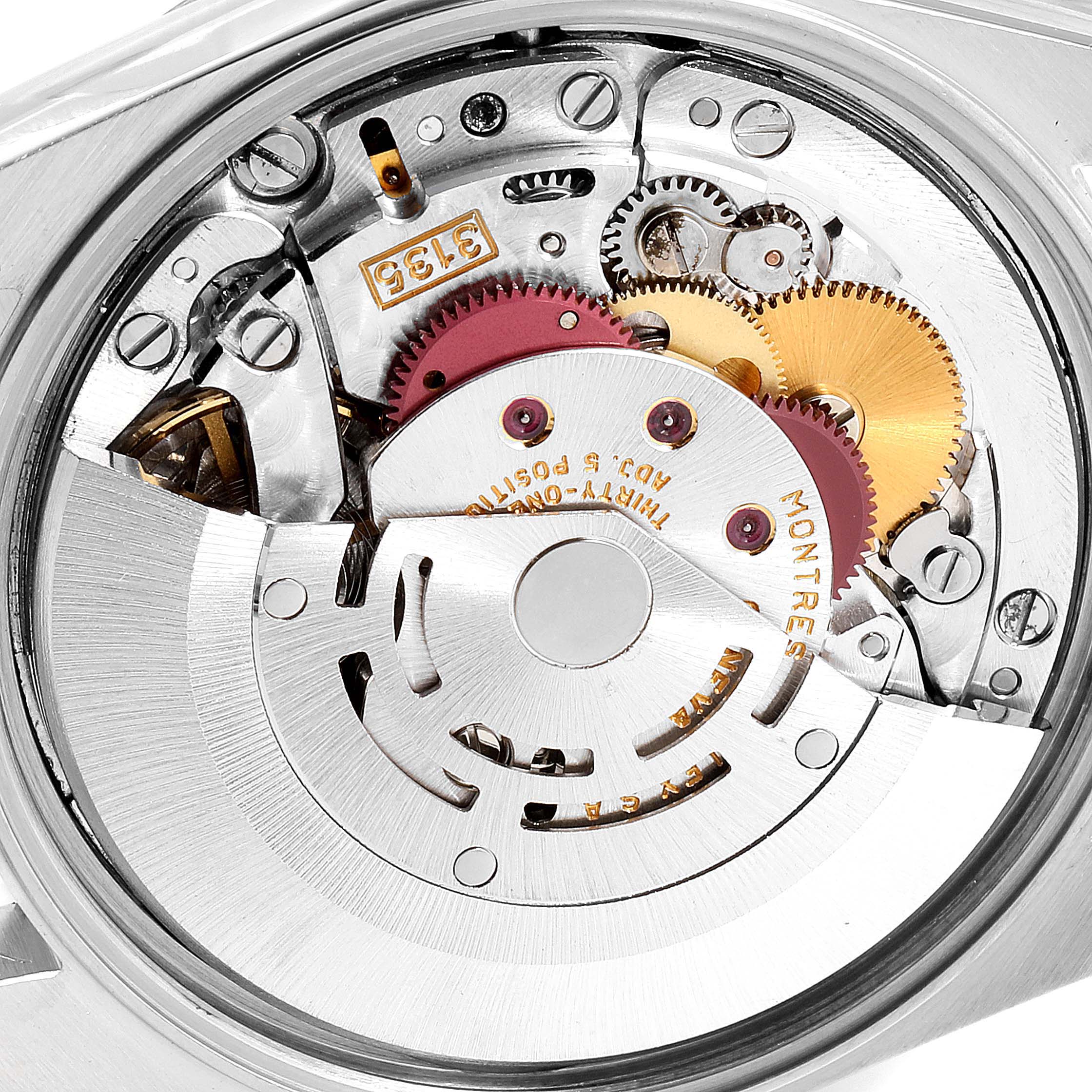 This is a close-up view of the inner mechanical components of a Rolex Datejust 15200 Men's Stainless Steel Blue Dial 15200 Men's Stainless Steel Blue Dial watch.