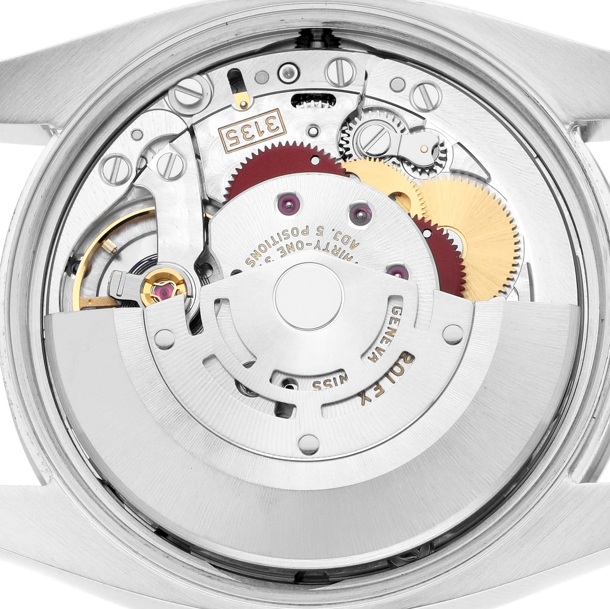 The image shows the movement of a Rolex Oyster Perpetual 115200 Men
s Stainless Steel Pink Dial watch, highlighting gears and intricate mechanical parts from the back.