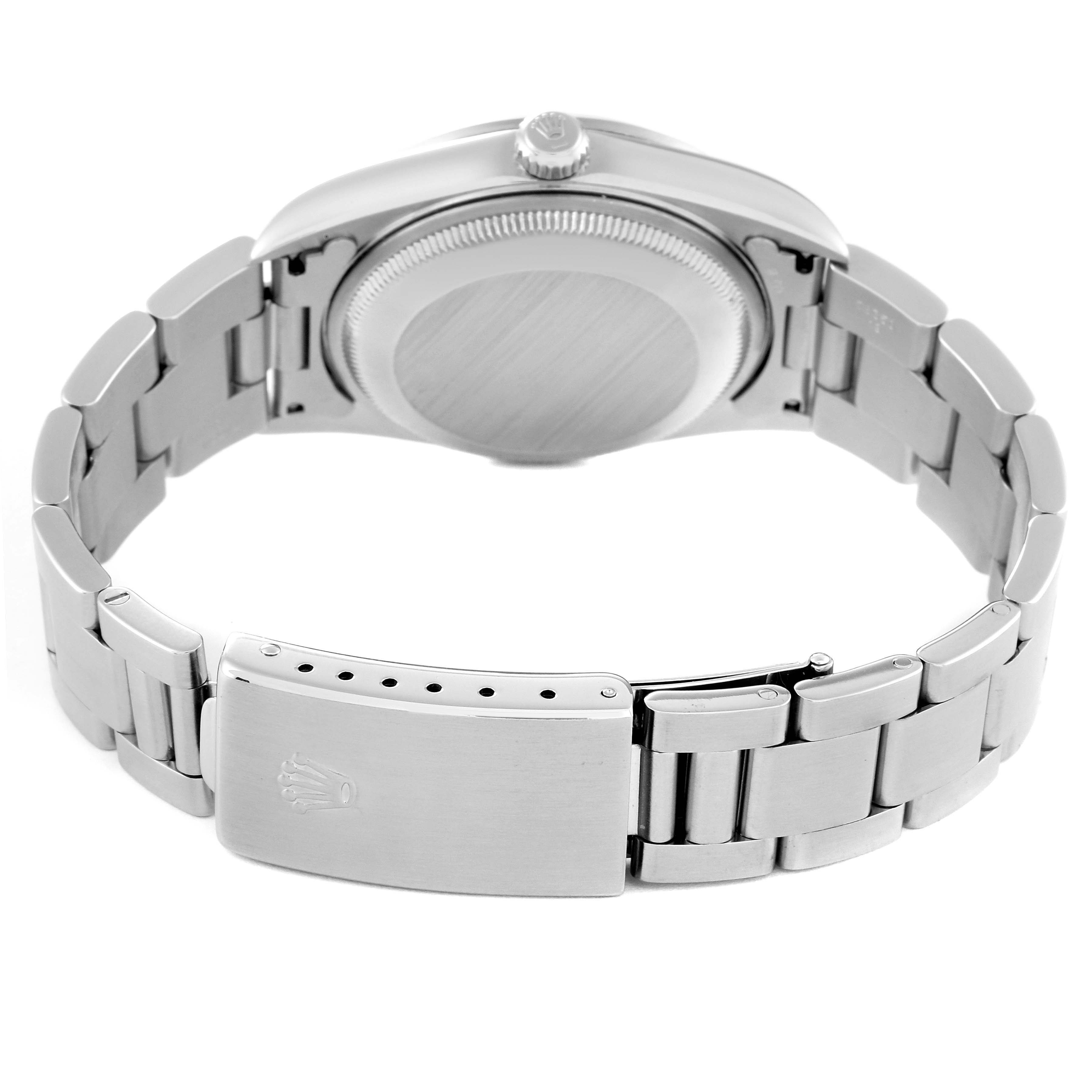 The image shows the back view of a Rolex Date 15200 Men's Stainless Steel White Dial 15200 Men's Stainless Steel White Dial model, including its case back, crown, and metal bracelet with a clasp.