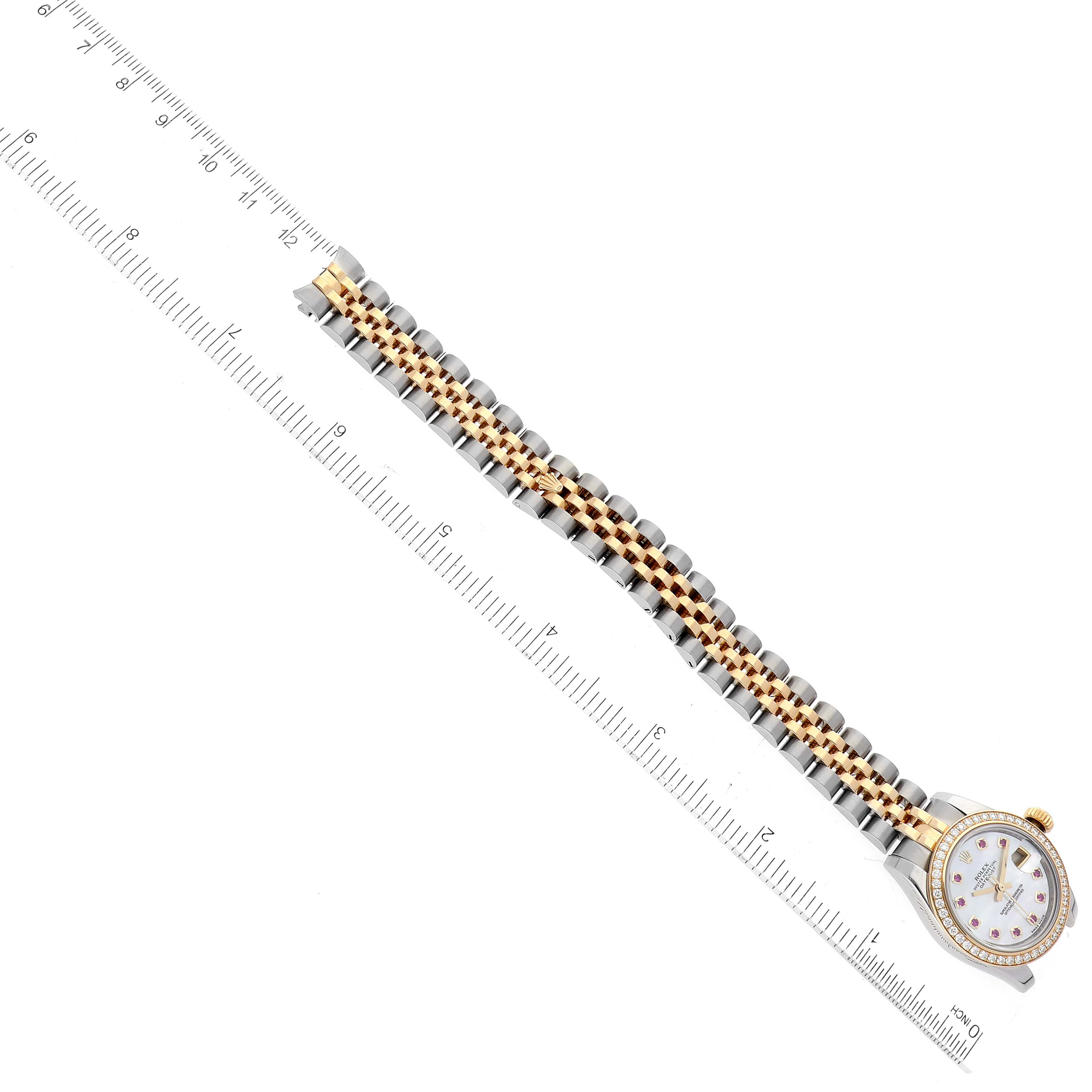 The image shows a Rolex Datejust 179383 Women's Steel and Gold (two tone) Mother of Pearl Dial 179383 Women's Steel and Gold (two tone) Mother of Pearl Dial watch face and band at a top-down angle, aligned with a ruler for scale.