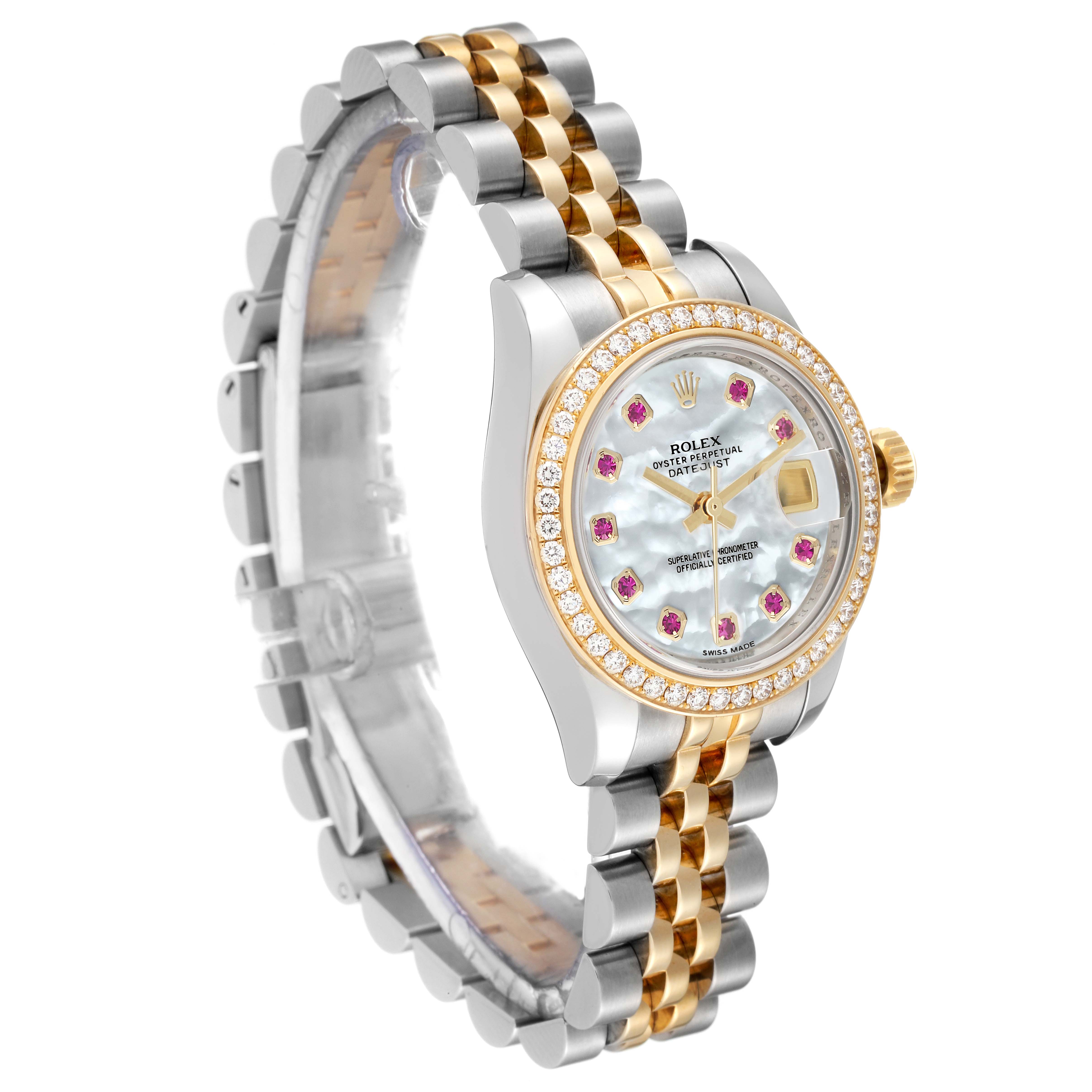 The Rolex Datejust 179383 Women's Steel and Gold (two tone) Mother of Pearl Dial 179383 Women's Steel and Gold (two tone) Mother of Pearl Dial watch is shown at an angle highlighting the two-tone bracelet, bezel with diamonds, and mother-of-pearl dial with ruby hour markers.