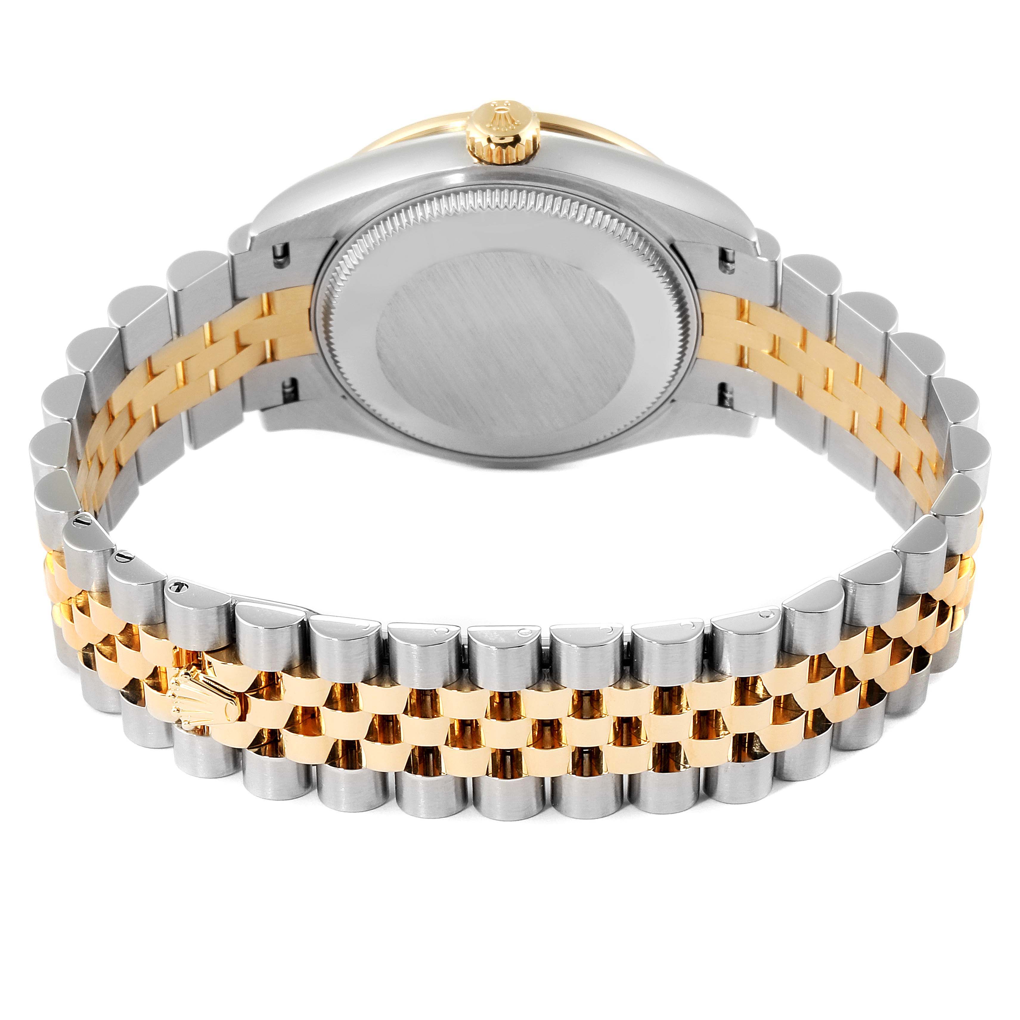 The image shows the back view of a Mid-Size Rolex watch, highlighting the bracelet and caseback.