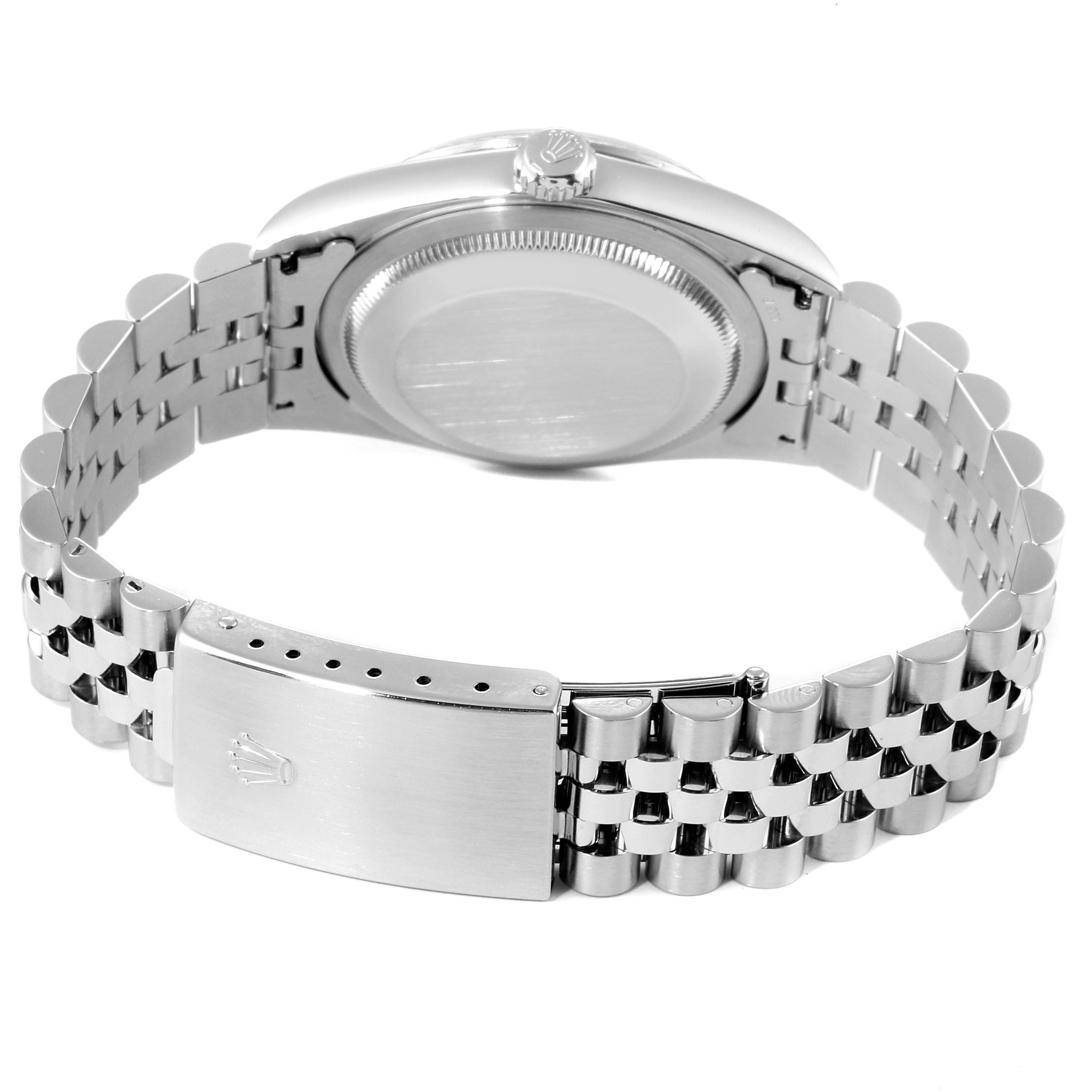 This image shows a side view of the Rolex Datejust 16234 Men's Stainless Steel Blue Dial 16234 Men's Stainless Steel Blue Dial watch, focusing on the case back and bracelet with the clasp visible.