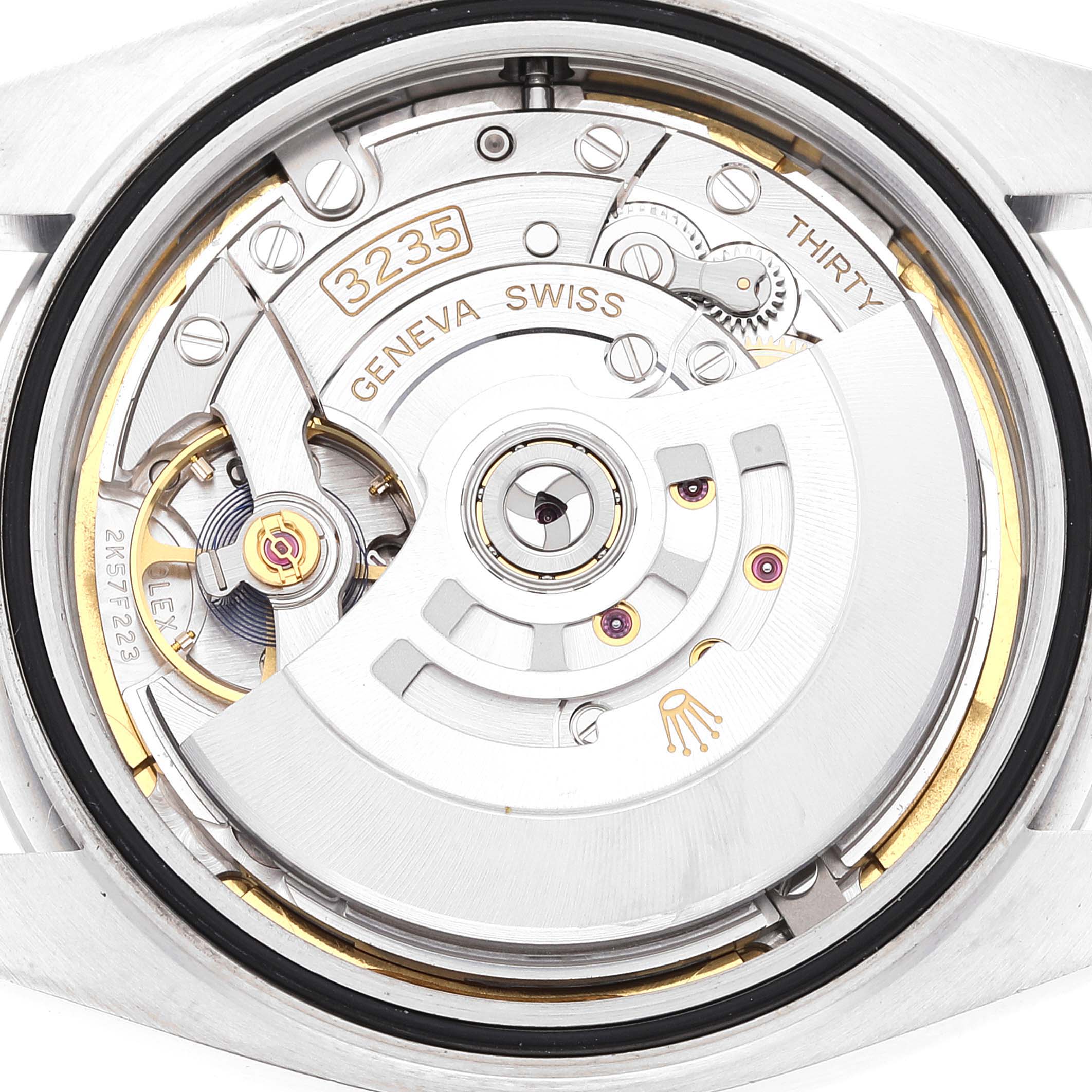 The image shows the intricate movement and internal mechanism of a Rolex Datejust 41 126300 Men's Stainless Steel Blue Dial 126300 Men's Stainless Steel Blue Dial model from a close-up angle.