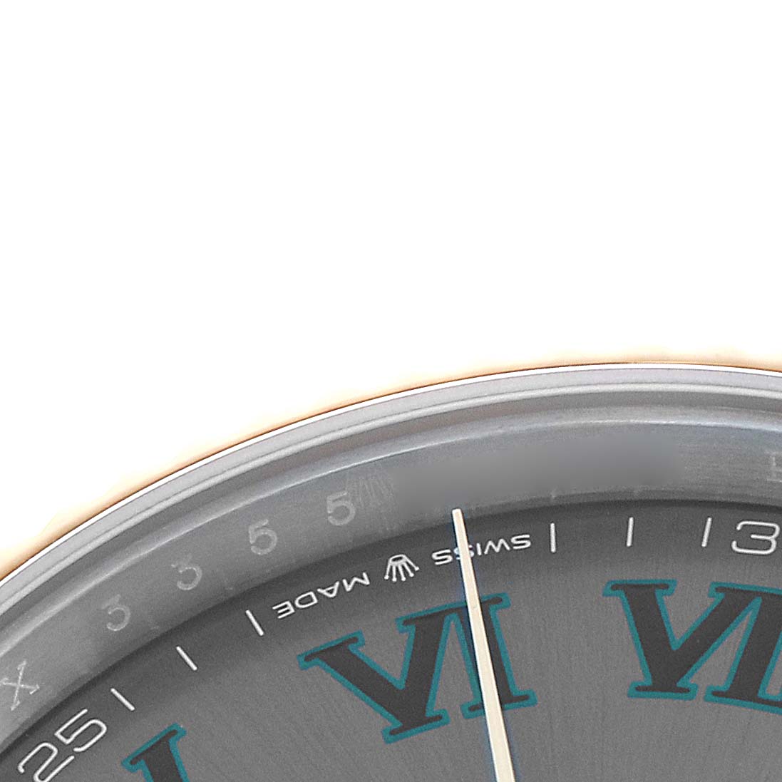 The image shows a close-up of the dial and bezel edge of a Rolex Datejust 41 126333 Men
s Steel and Gold (two tone) Grey Dial, highlighting Roman numerals and minute markers.