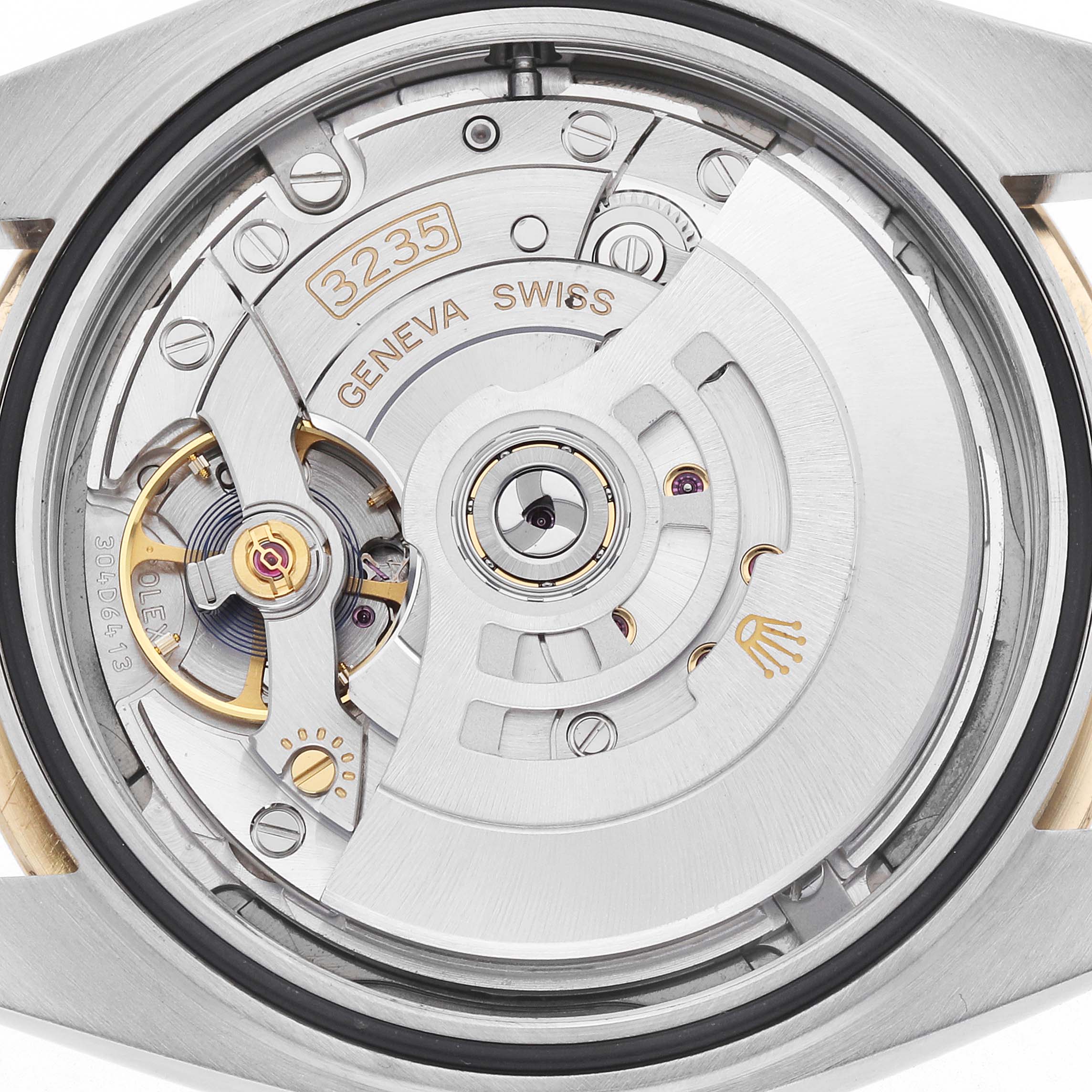 The image shows the Rolex Datejust 41 126333 Men
s Steel and Gold (two tone) Grey Dial
s movement from a back angle, highlighting the intricate mechanics and rotor with the "3235" marking.