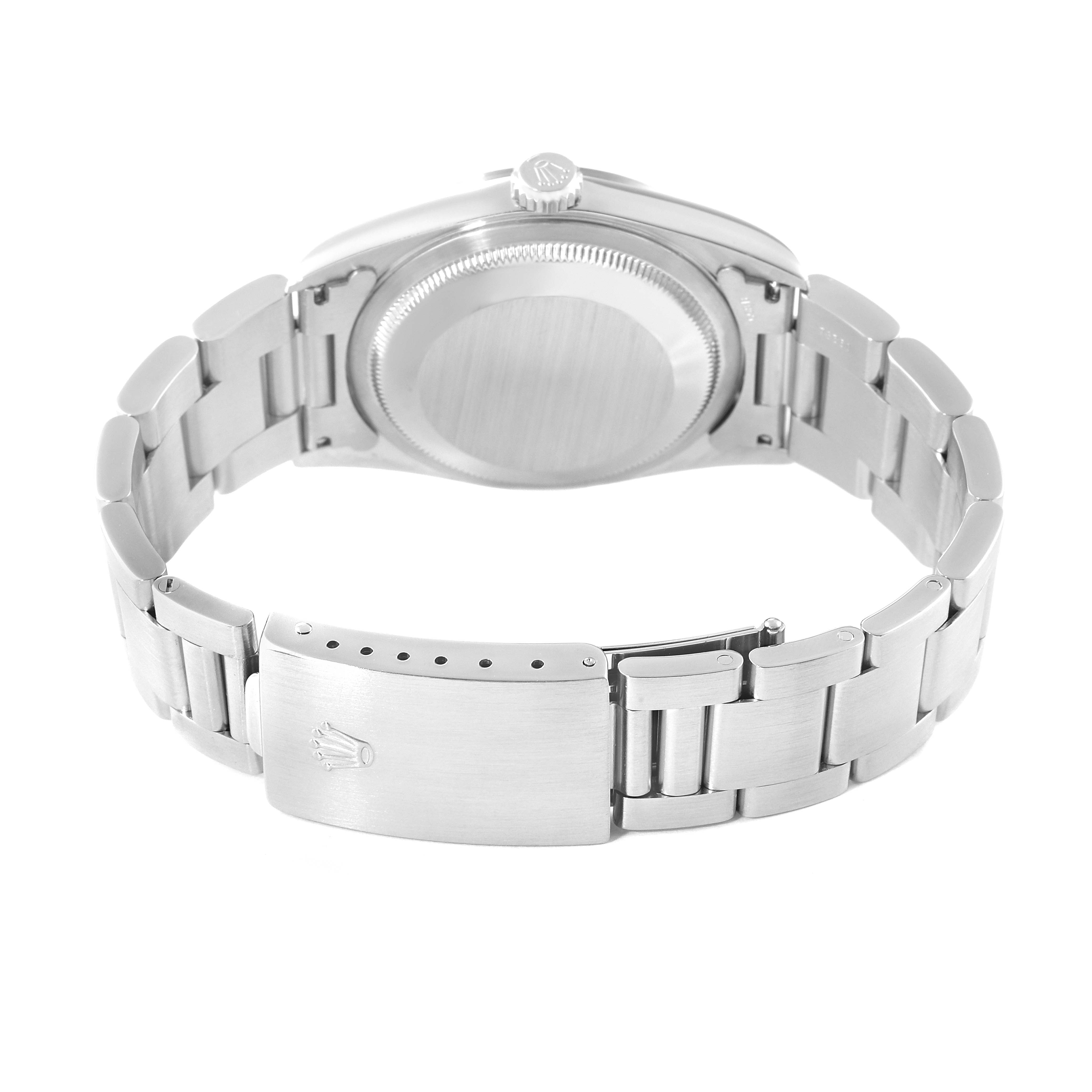 The image shows the backside of a Rolex Datejust 16200 Men's Stainless Steel Blue Dial 16200 Men's Stainless Steel Blue Dial watch, highlighting the case back and the clasp of the bracelet.