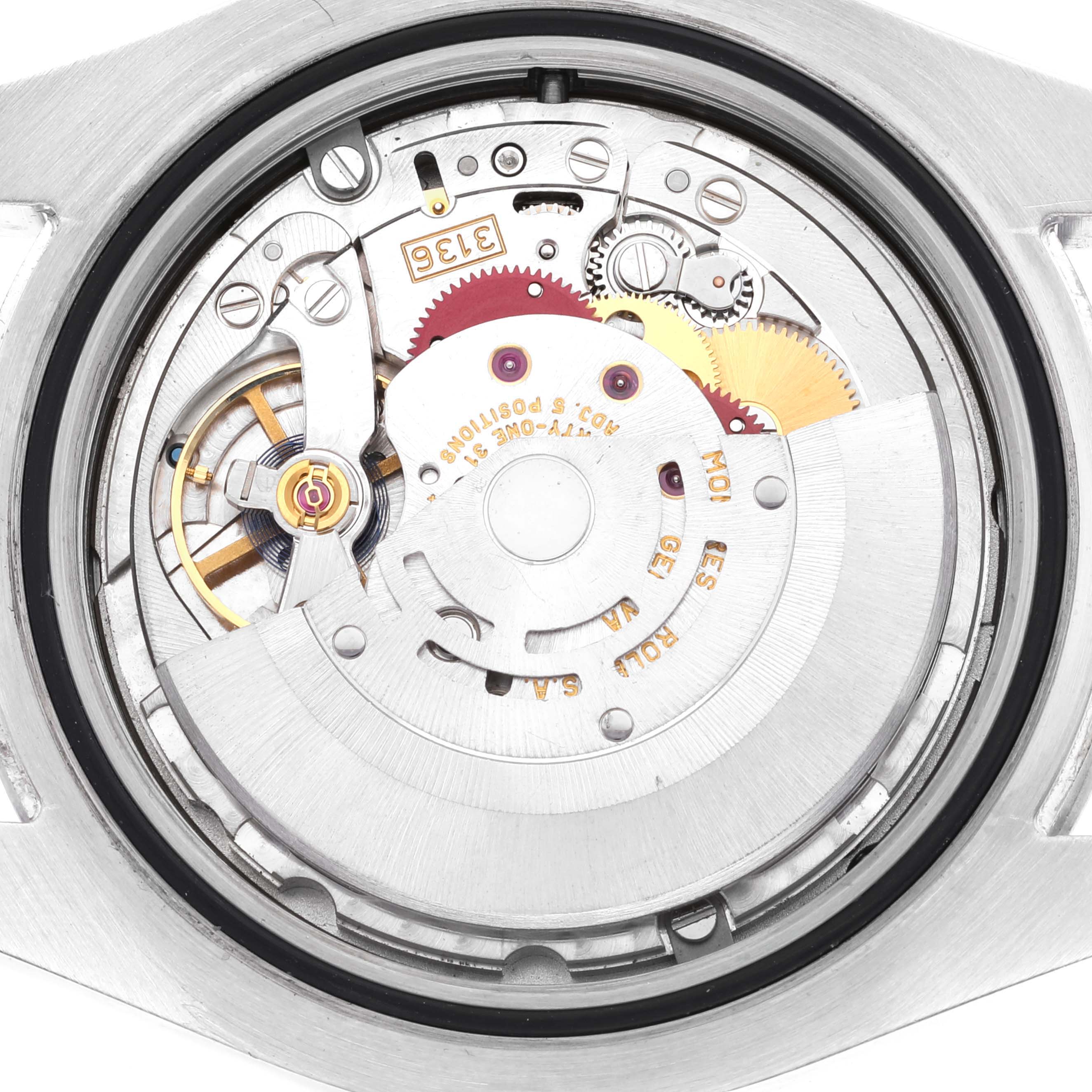 This is a macro shot of the backside of a Rolex Datejust 41 116300 Men
s Stainless Steel Blue Dial 116300 Men
s Stainless Steel Blue Dial, displaying the intricate inner workings and automatic movement.