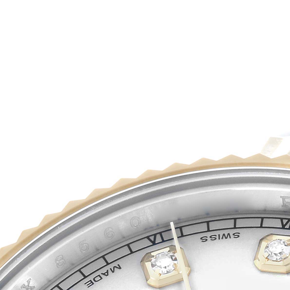 The image shows a close-up of the dial edge and diamond hour markers of a Rolex Datejust 41 116333 Men
s Steel and Gold (two tone) Silver Dial, highlighting the bezel and part of the minute hand.