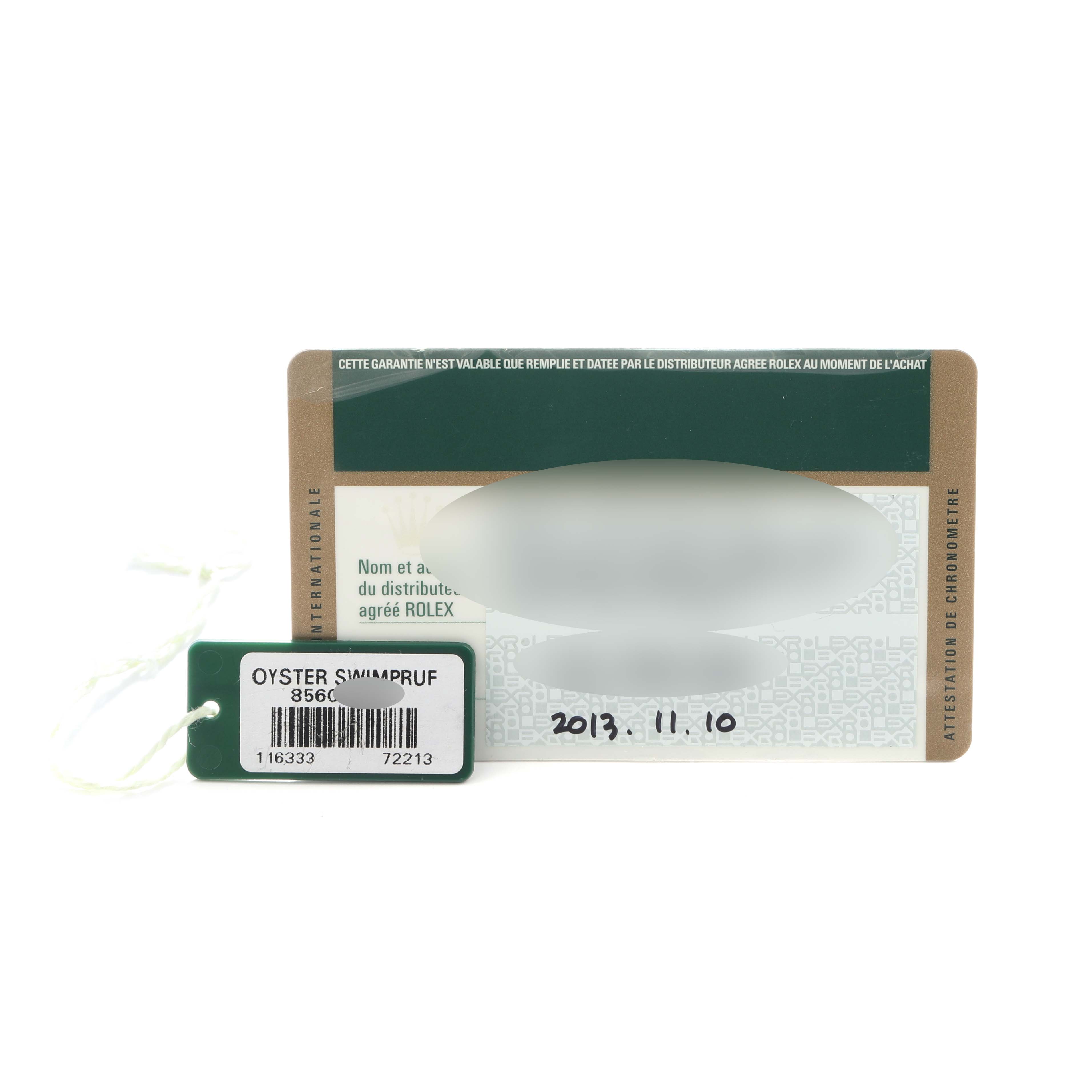 The image shows warranty cards and a tag for the Rolex Datejust 41 116333 Men
s Steel and Gold (two tone) Silver Dial model, displayed from a flat angle.