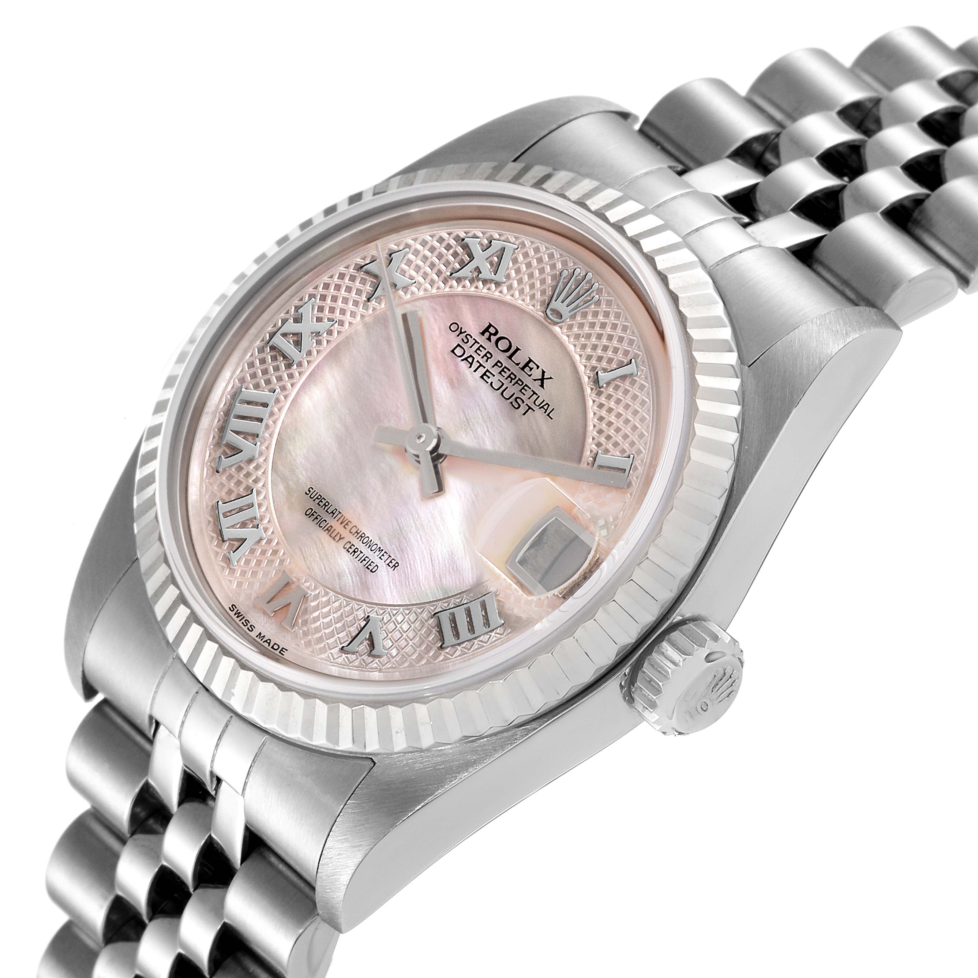 The image shows a close-up side angle of the dial, crown, and bracelet of a Rolex Mid-Size 78274 Women
s Stainless Steel Mother of Pearl Dial 78274 Women
s Stainless Steel Mother of Pearl Dial Oyster Perpetual Datejust watch.