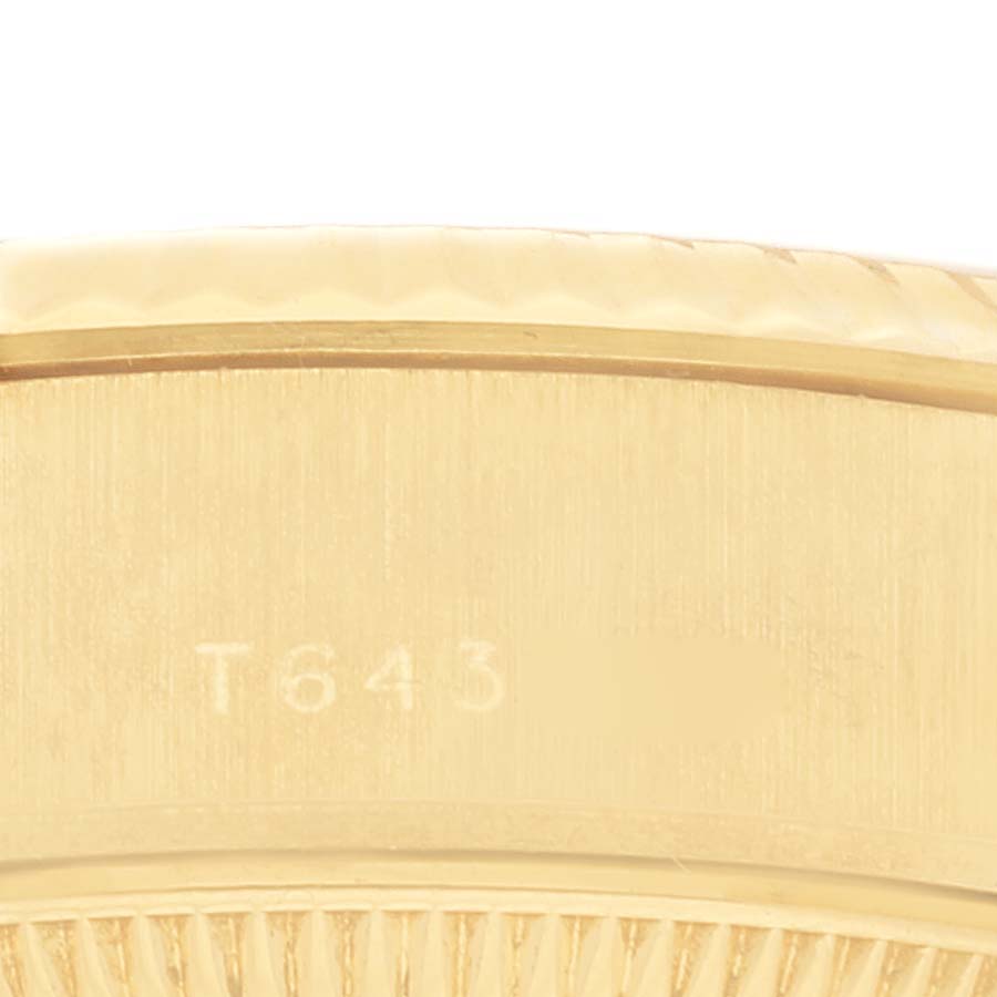 The image shows a close-up of the side of the case of a Rolex President 69178 Women's Yellow Gold Champagne Dial 69178 Women's Yellow Gold Champagne Dial model.