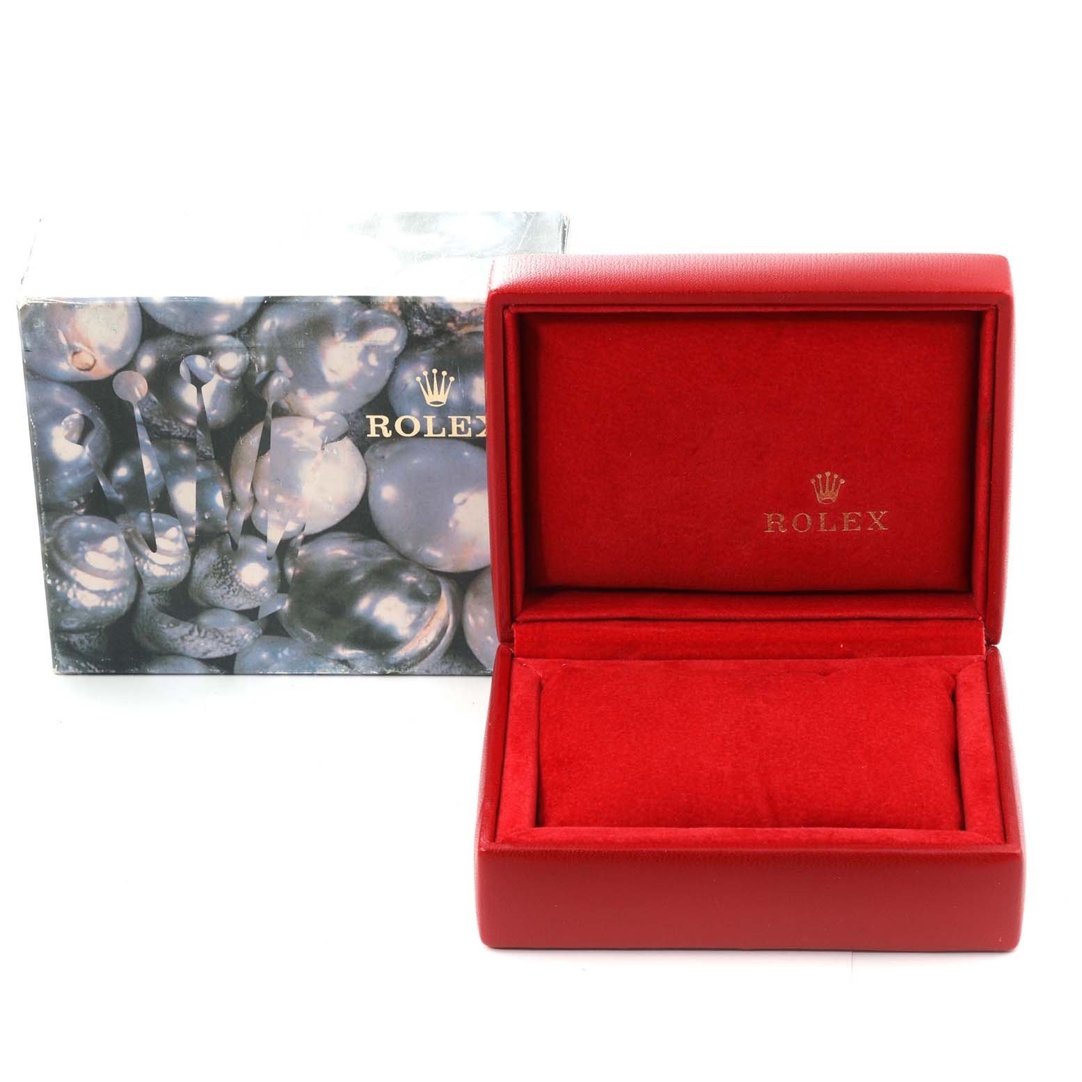 This image shows the packaging of the President model Rolex, including an open red box and an outer decorative box.