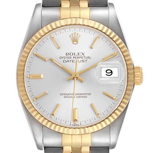 The Rolex Datejust 16013 Men's Steel and Gold (two tone) Silver Dial watch is shown from the front, highlighting the dial, fluted bezel, and date window.